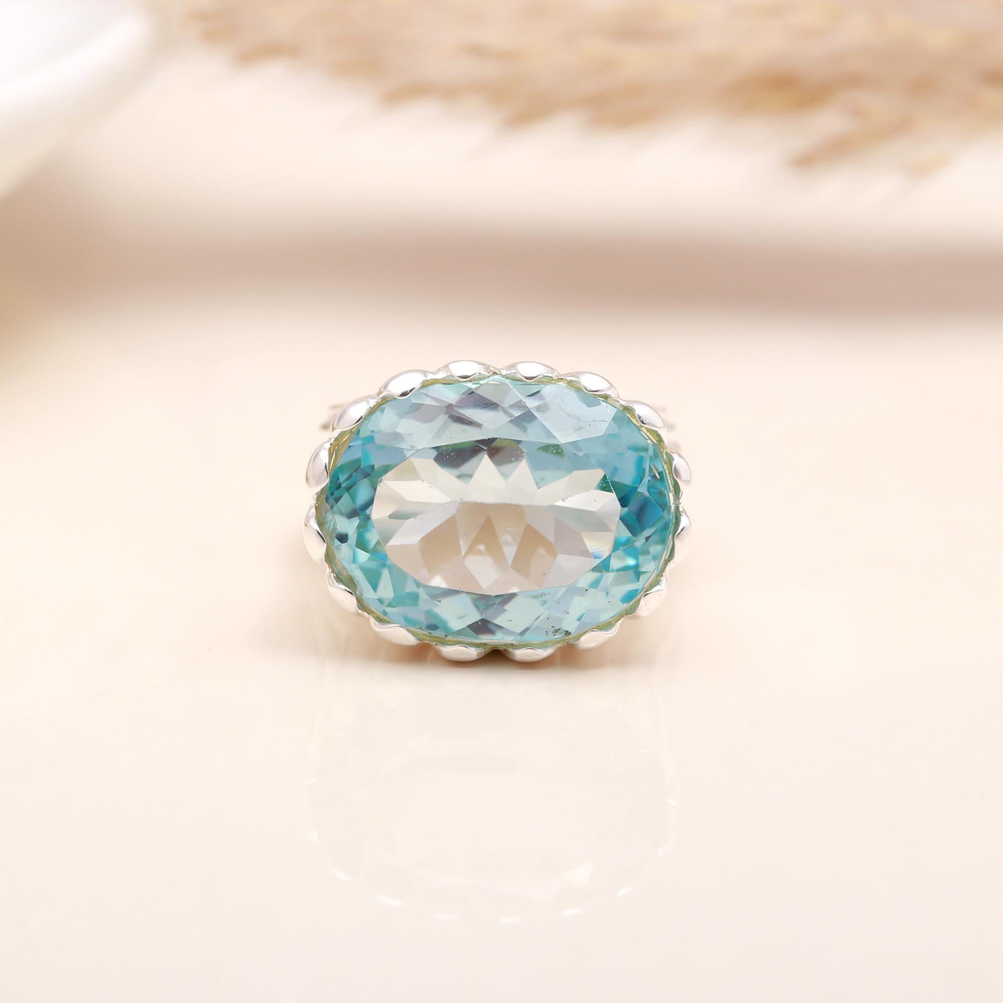 Oval Blue Topaz: High Profile Fluted Ring