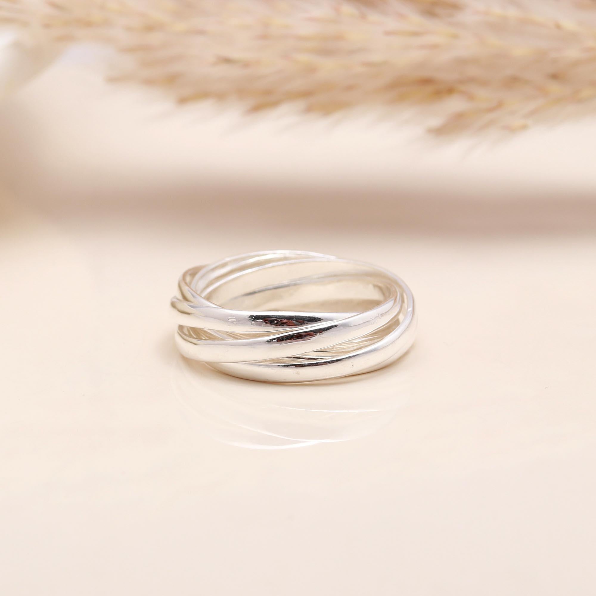 The Interlocking Trinity: Rolling Russian Wedding Ring