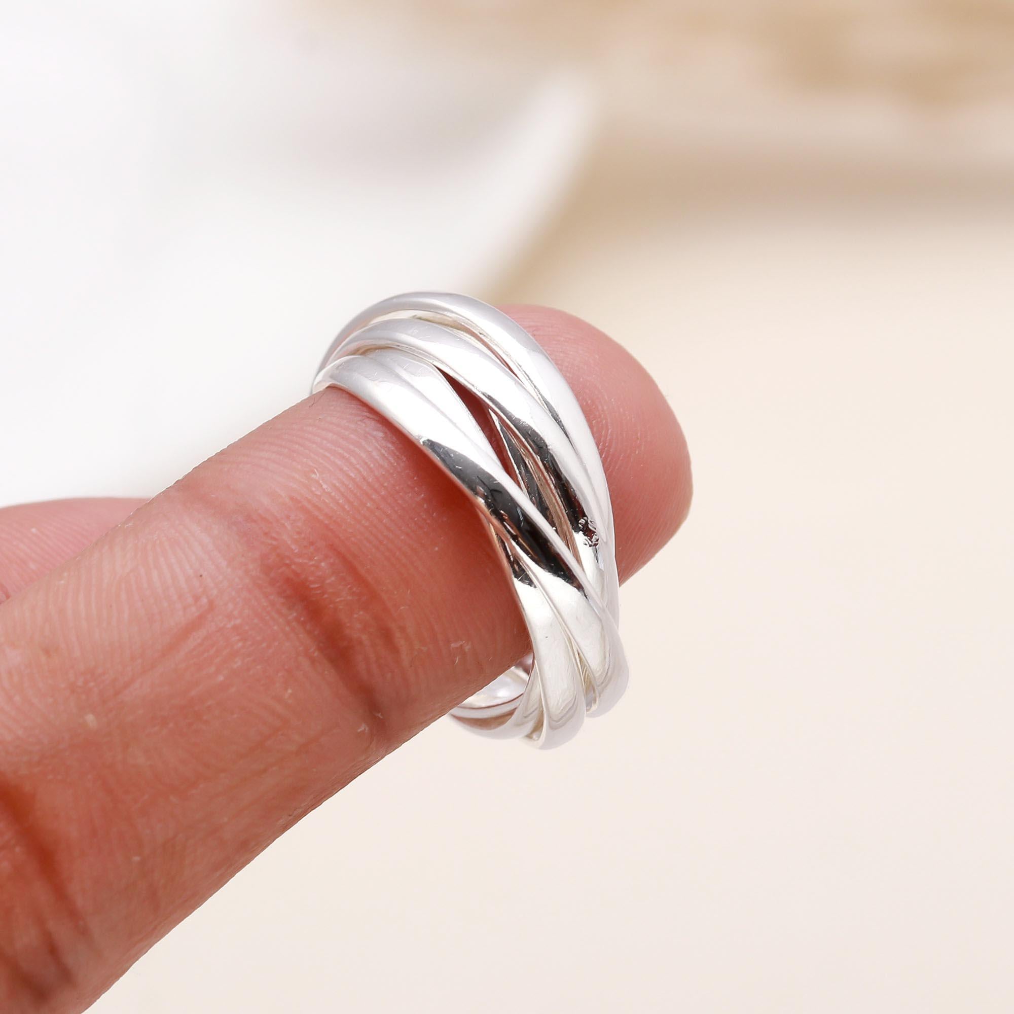 The Interlocking Trinity: Rolling Russian Wedding Ring