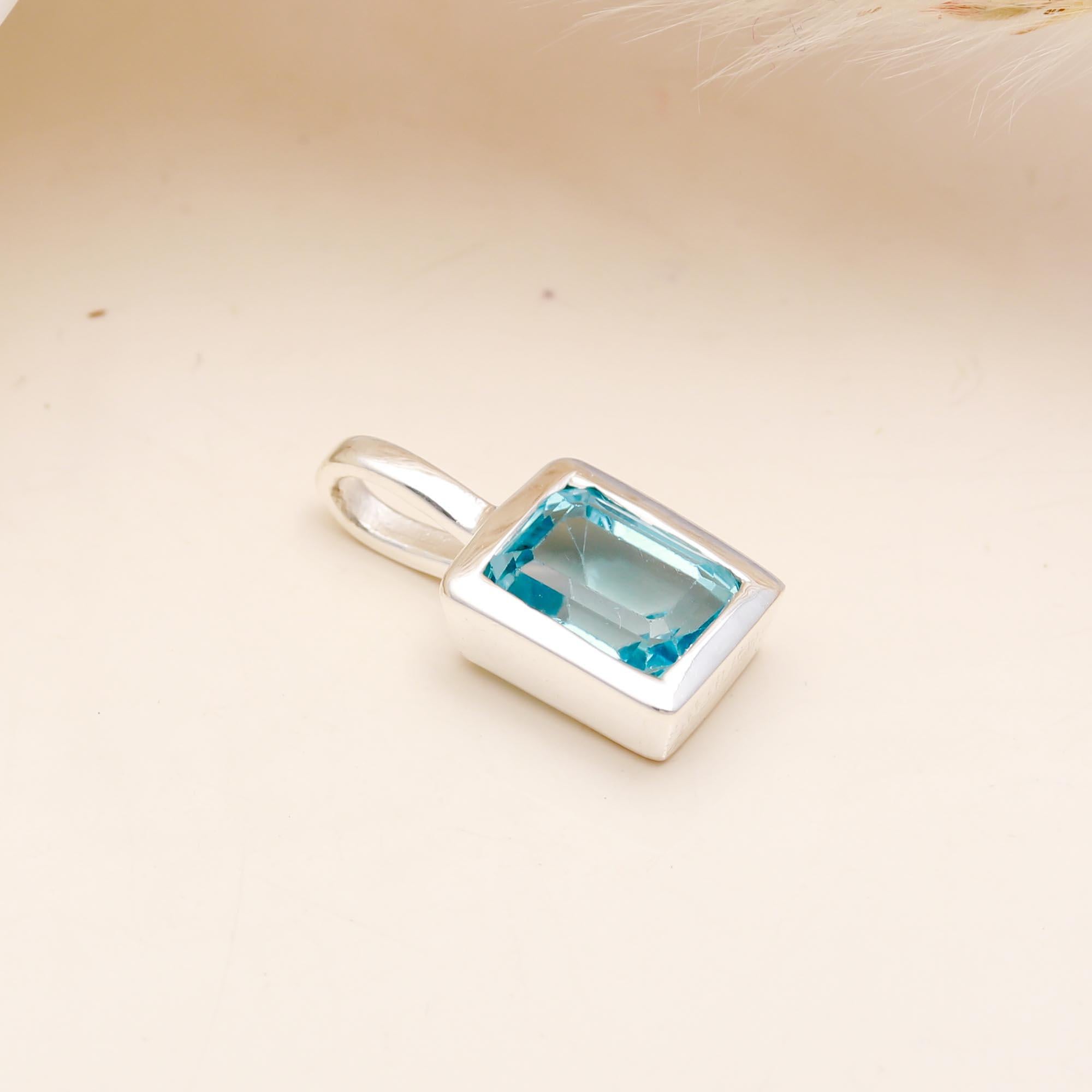 The Azure Prism: Blue Topaz Rectangular Silver Pendant