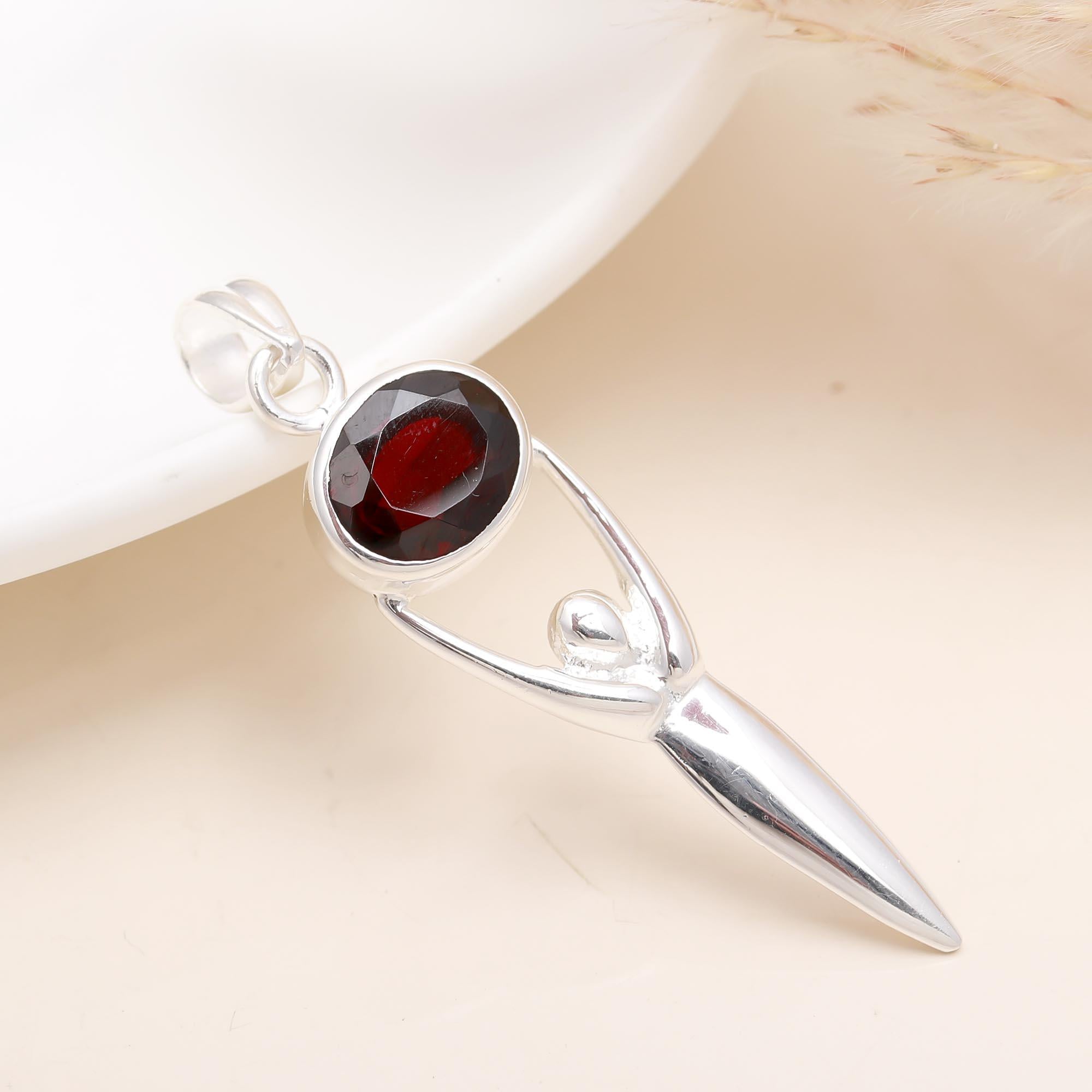 The Abstract Goddess Pendant: Stylized Garnet Figure Pendant