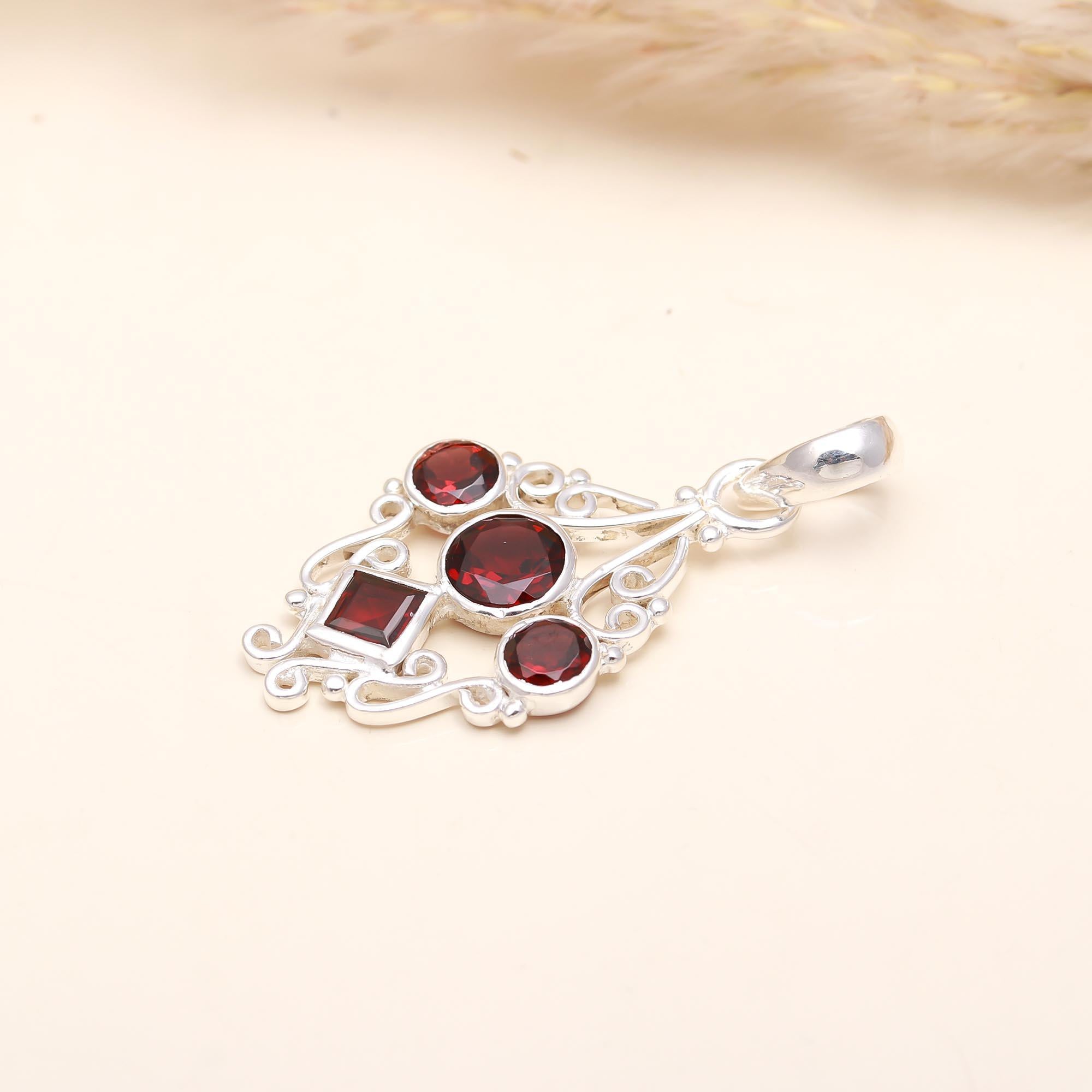 The Crimson Court: Multi-Cut Garnet Filigree Silver Pendant