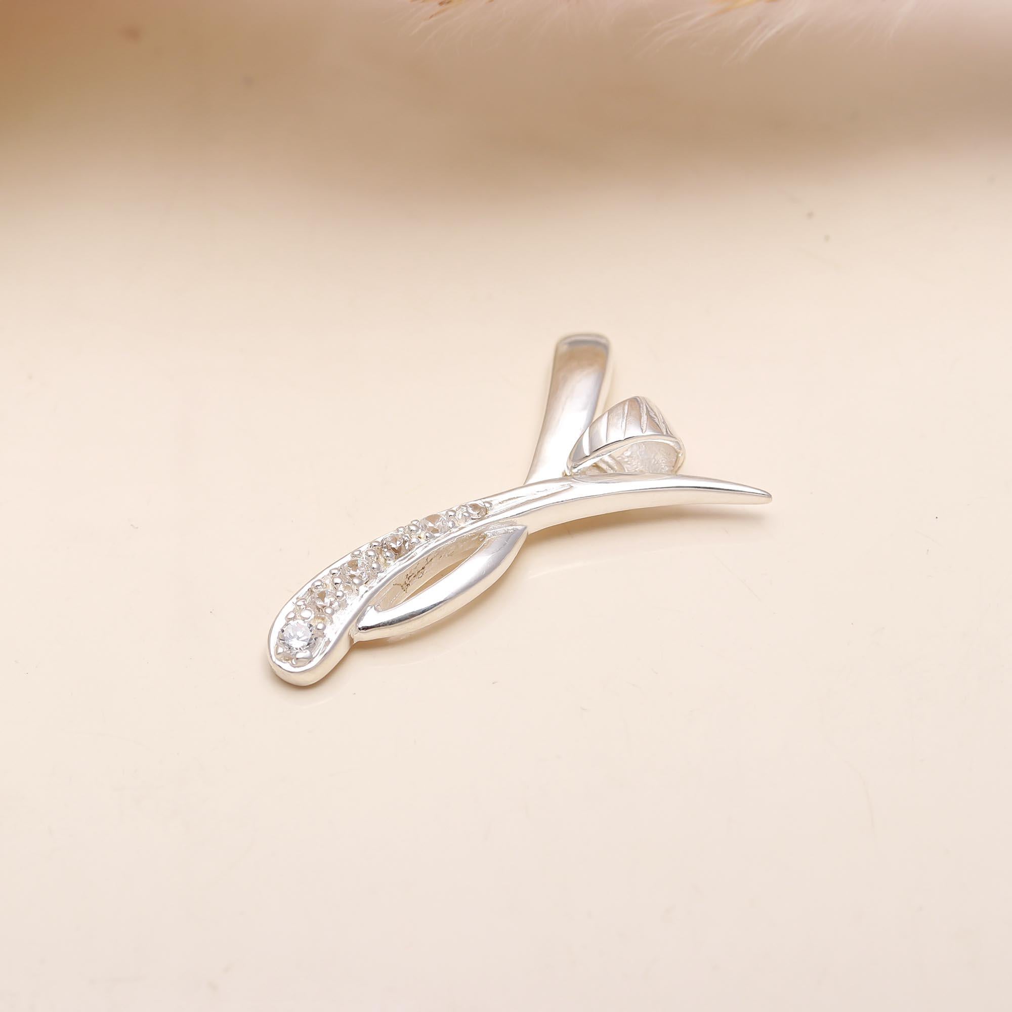 The Silver Ribbon: Cubic Zirconia Crossover Twist Silver Pendant