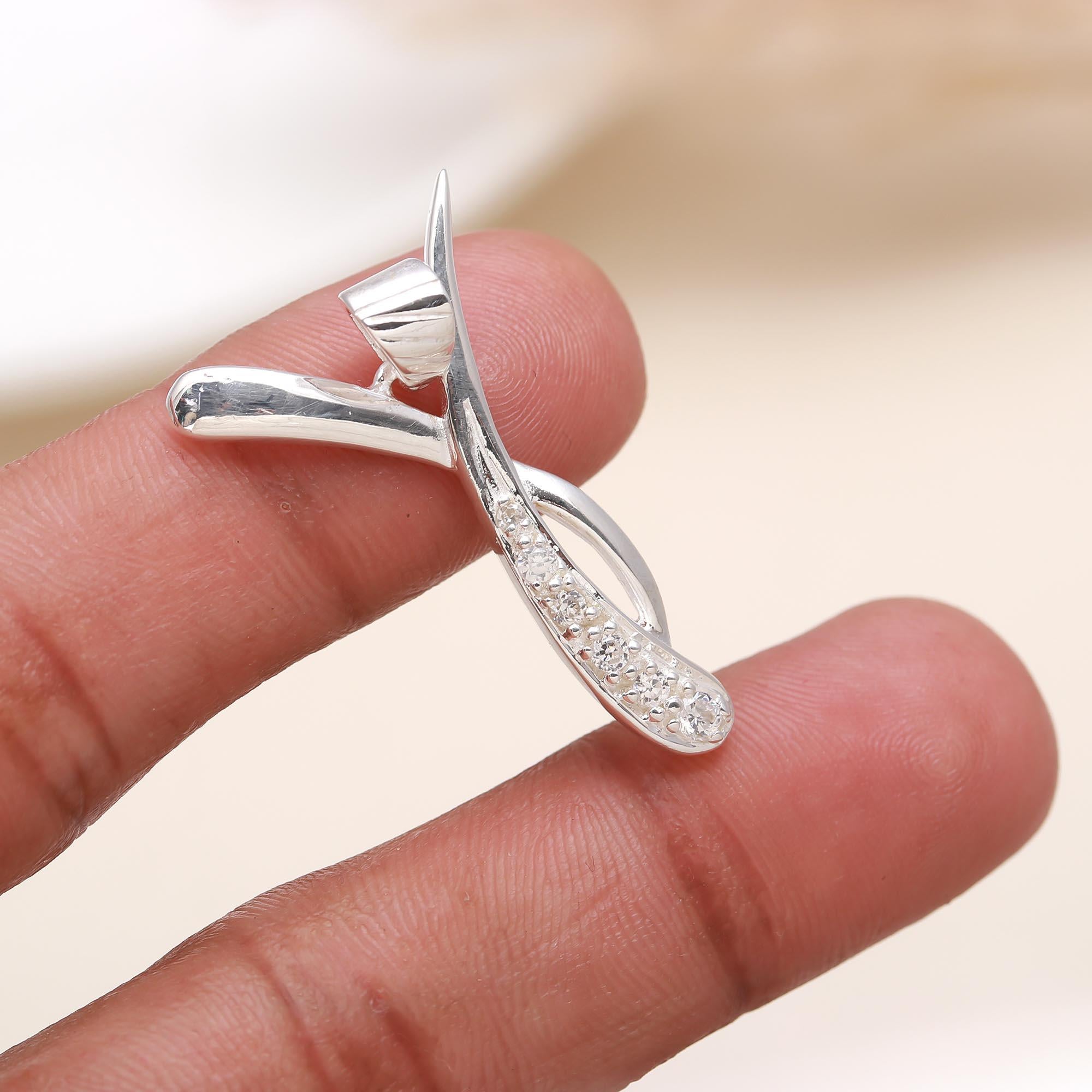 The Silver Ribbon: Cubic Zirconia Crossover Twist Silver Pendant