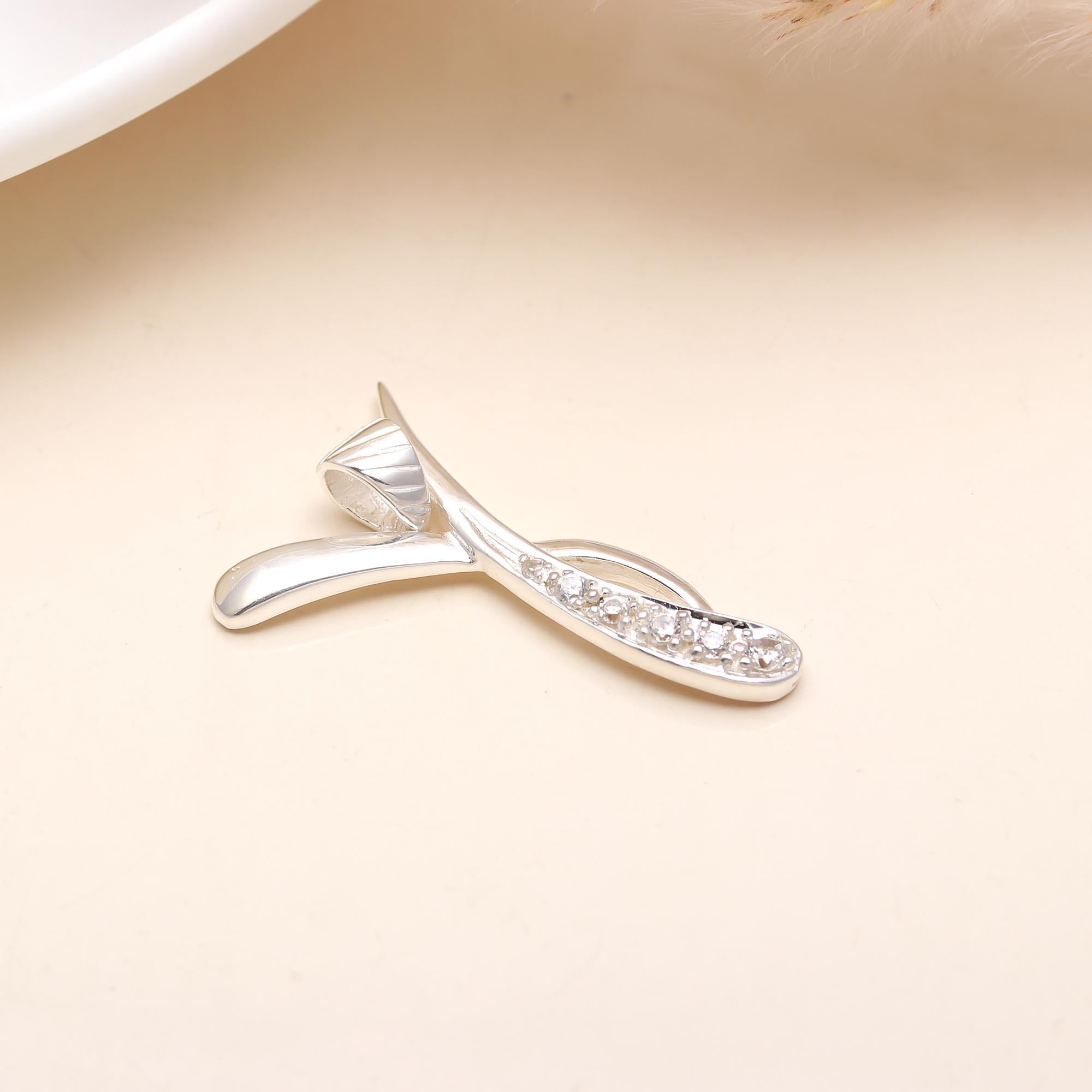 The Silver Ribbon: Cubic Zirconia Crossover Twist Silver Pendant
