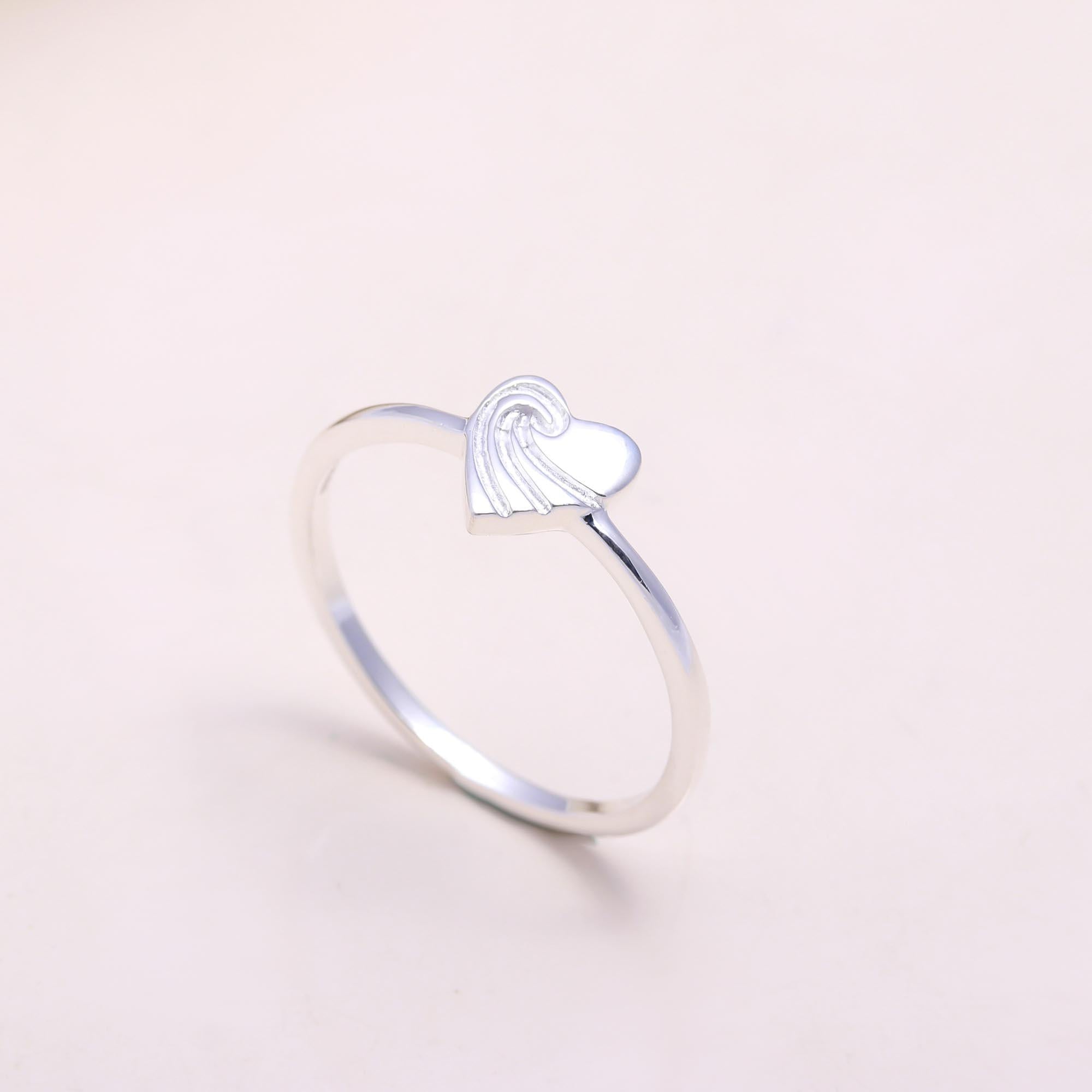 The Heart of the Sea: Wave Engraved Heart Ring