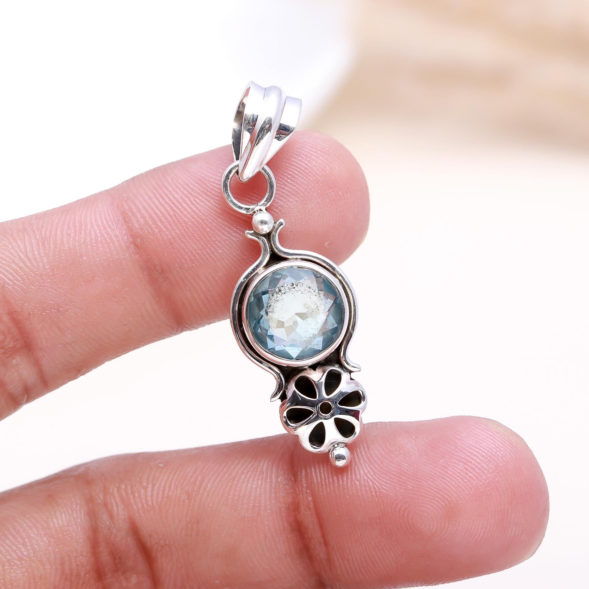 The Petal Cascade: Blue Topaz Articulated Pendant