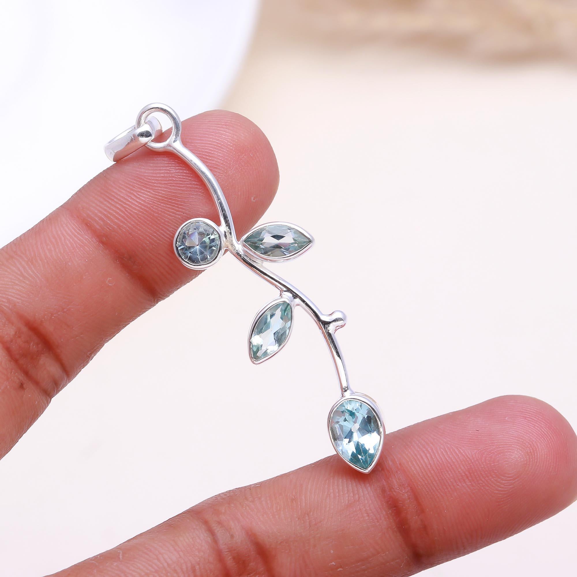 The Nature's Path: Blue Topaz Leaf Branch Pendant