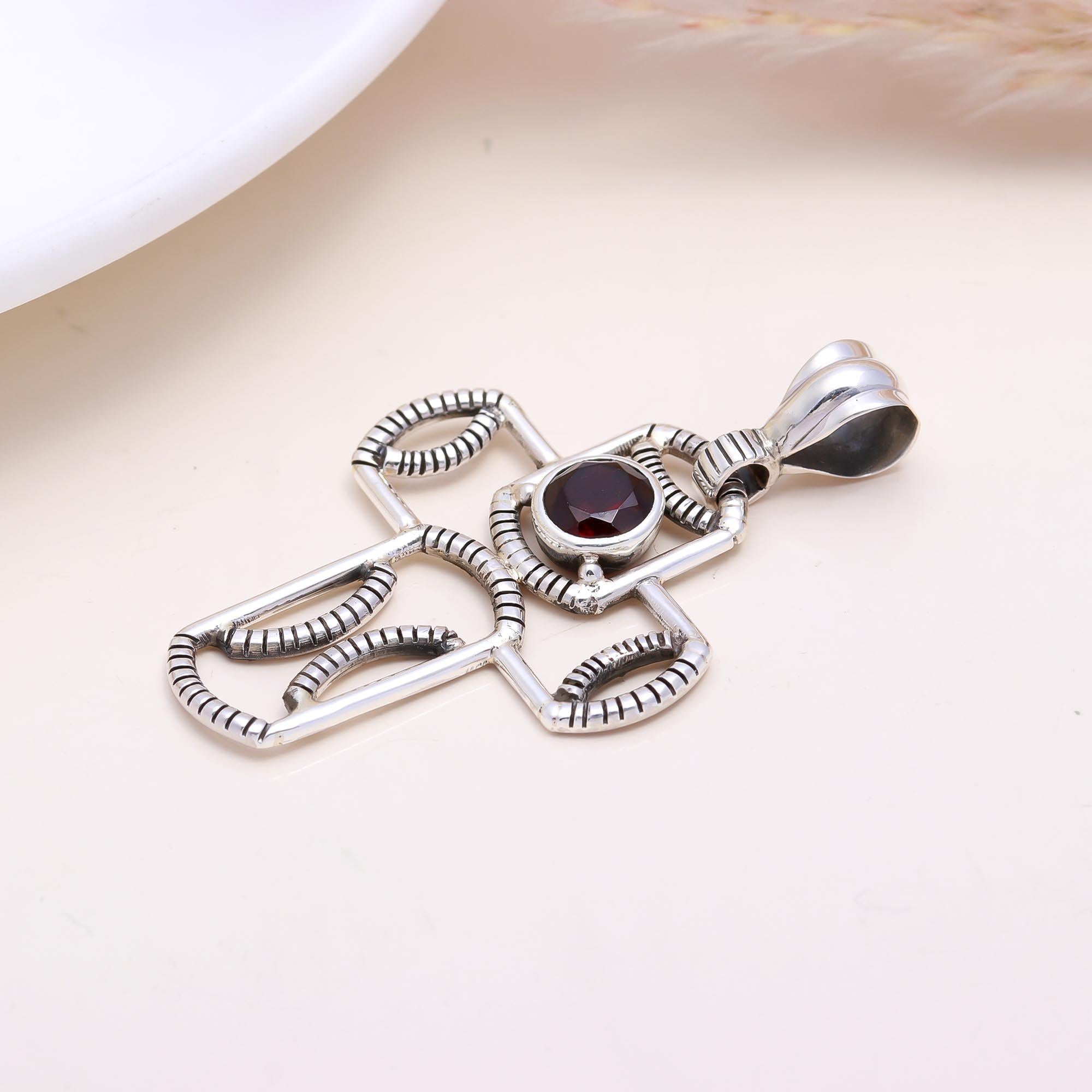 The Tribal Shield: Garnet Wire-Work Pendant