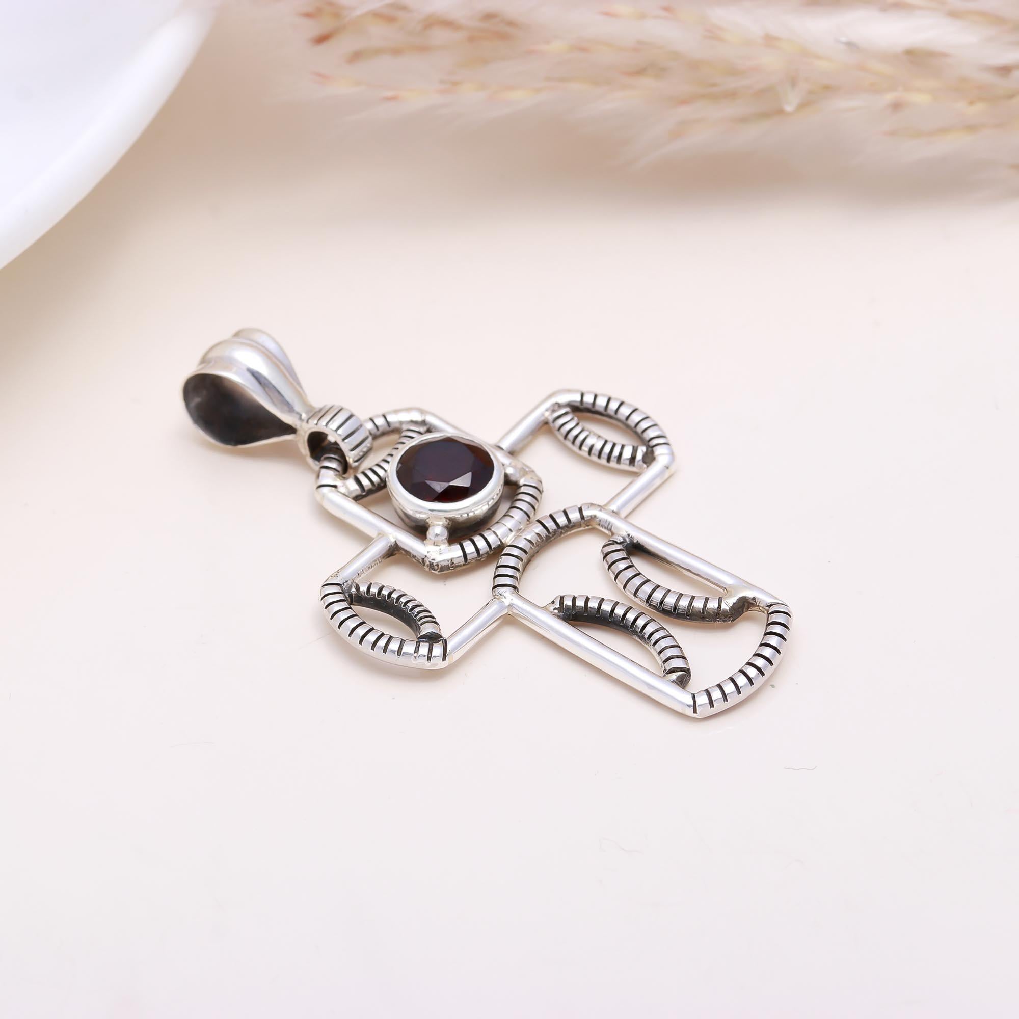 The Tribal Shield: Garnet Wire-Work Pendant