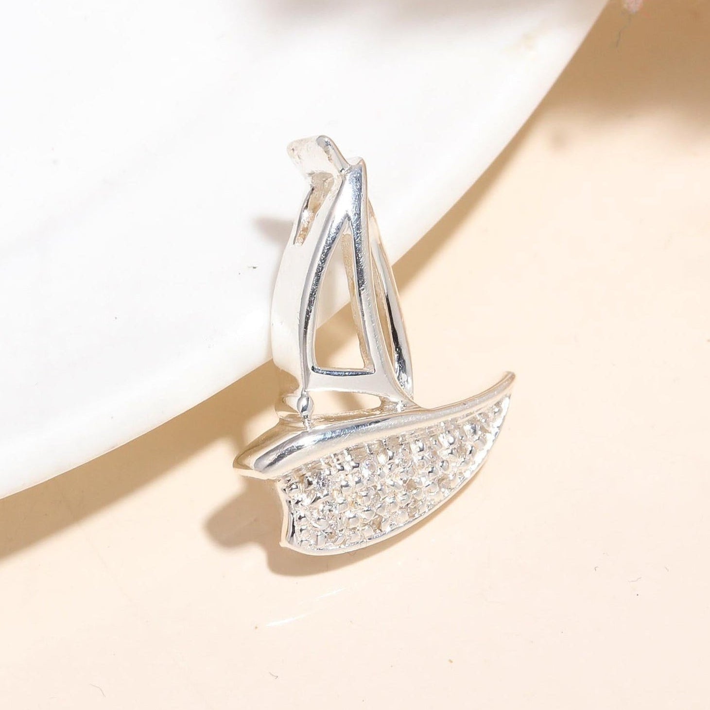 The Crystal Sails: Sparkling Nautical Traveler Pendant