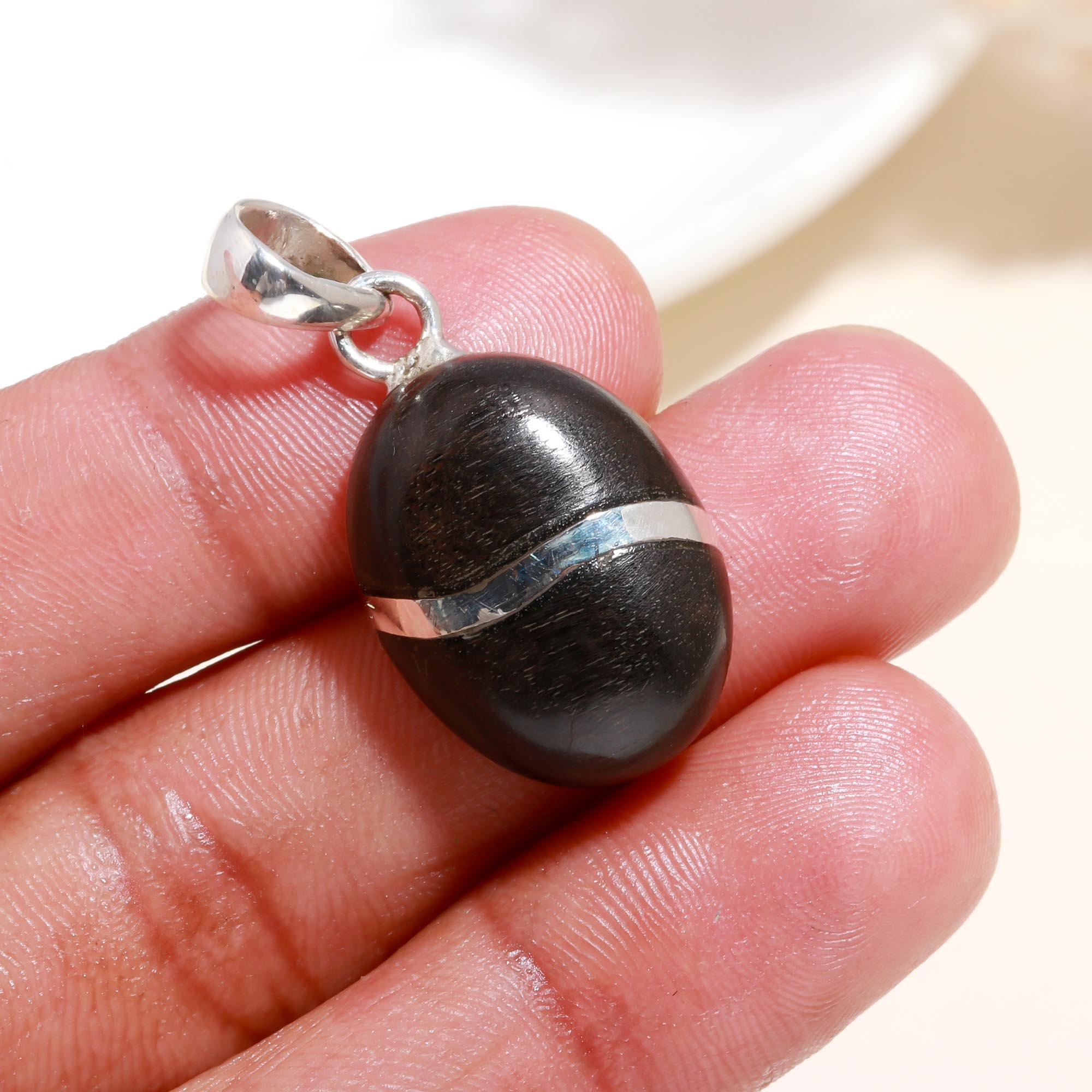 The Ebony Orb: Minimalist Silver Charm