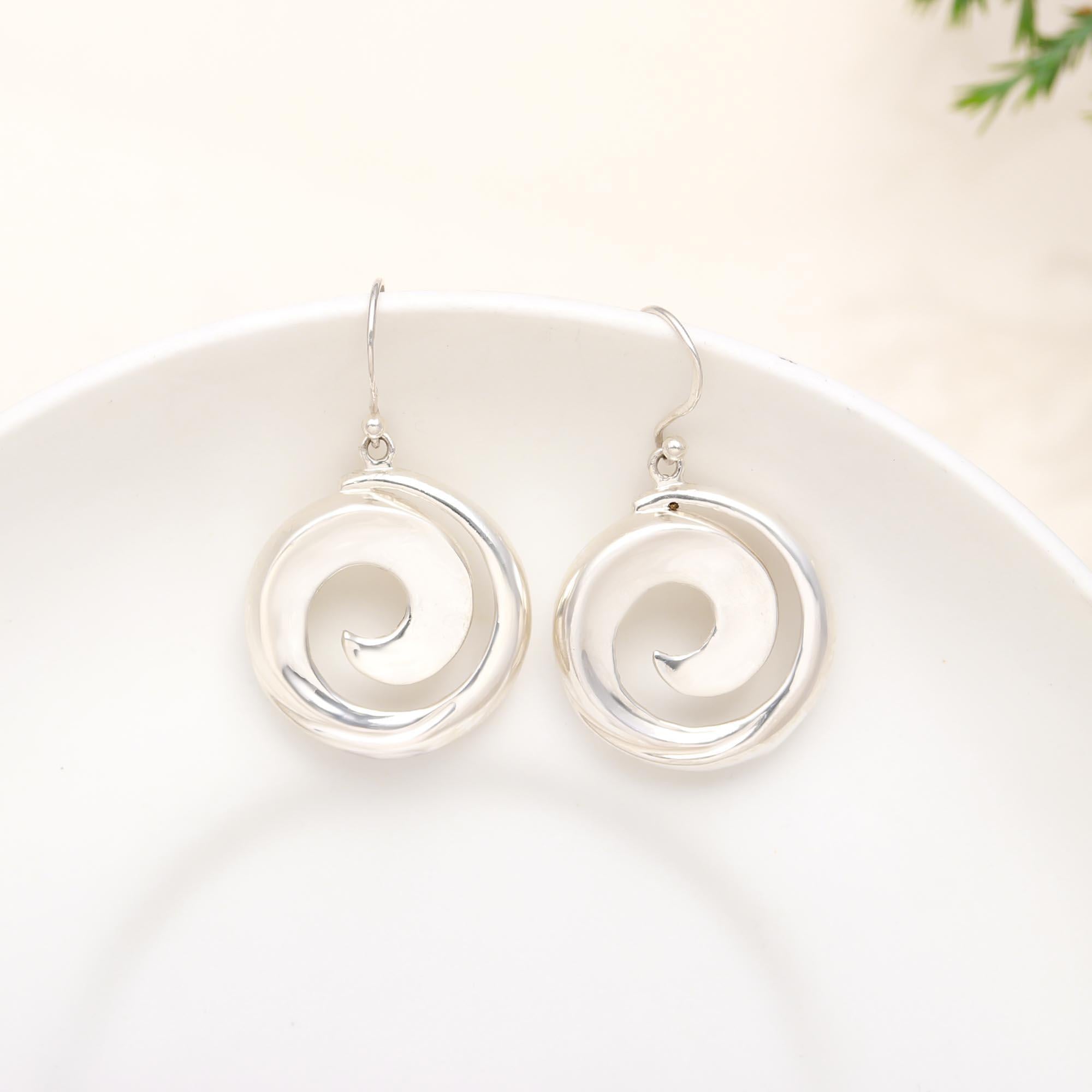 The Sterling Vortex: Polished Silver Spiral Drop Earrings