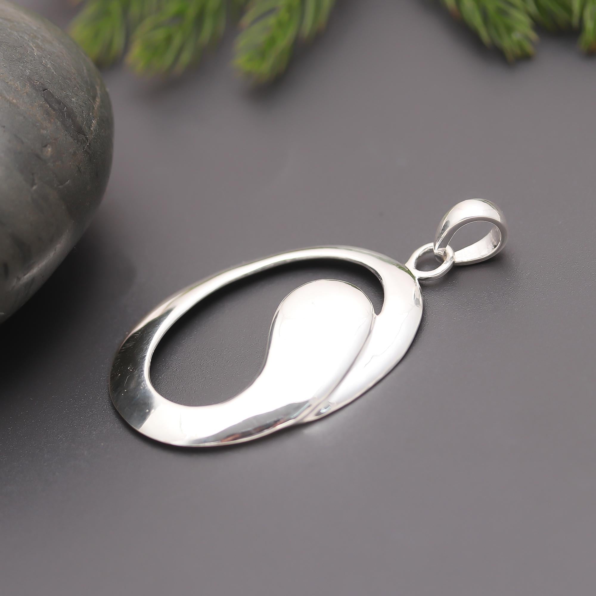 The Modern Orbit: Abstract Sterling Silver Oval Pendant