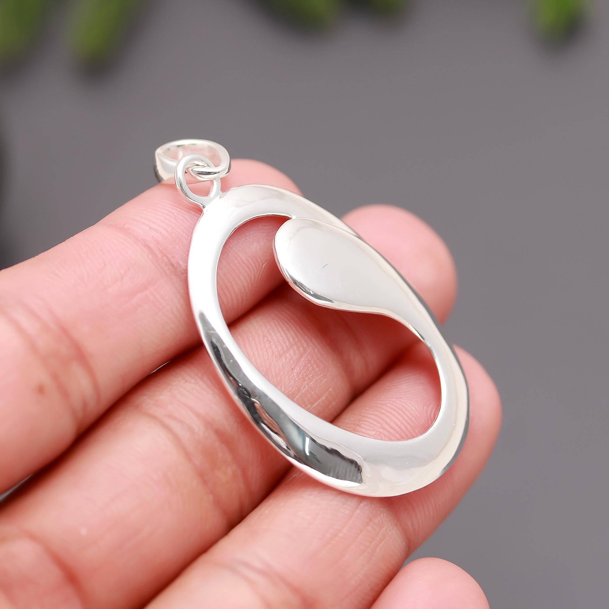 The Modern Orbit: Abstract Sterling Silver Oval Pendant