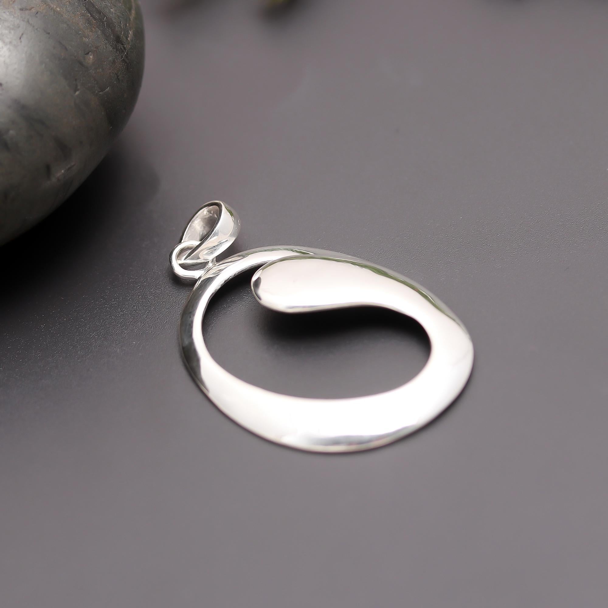 The Modern Orbit: Abstract Sterling Silver Oval Pendant