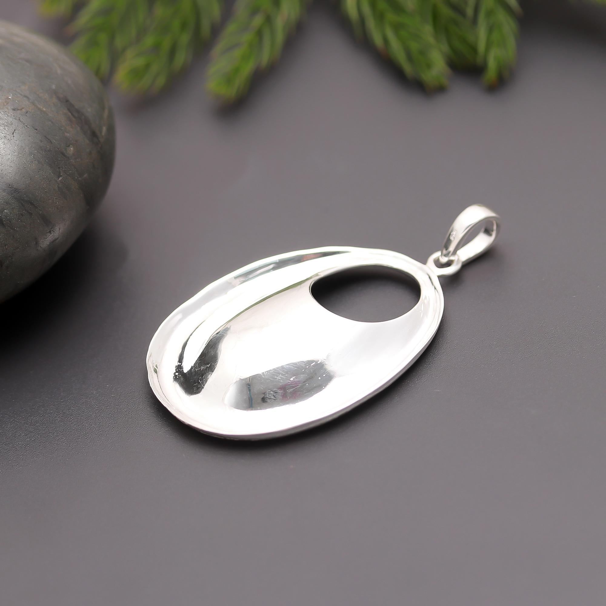 The Liquid Oval: Sculptural Sterling Silver Pendant