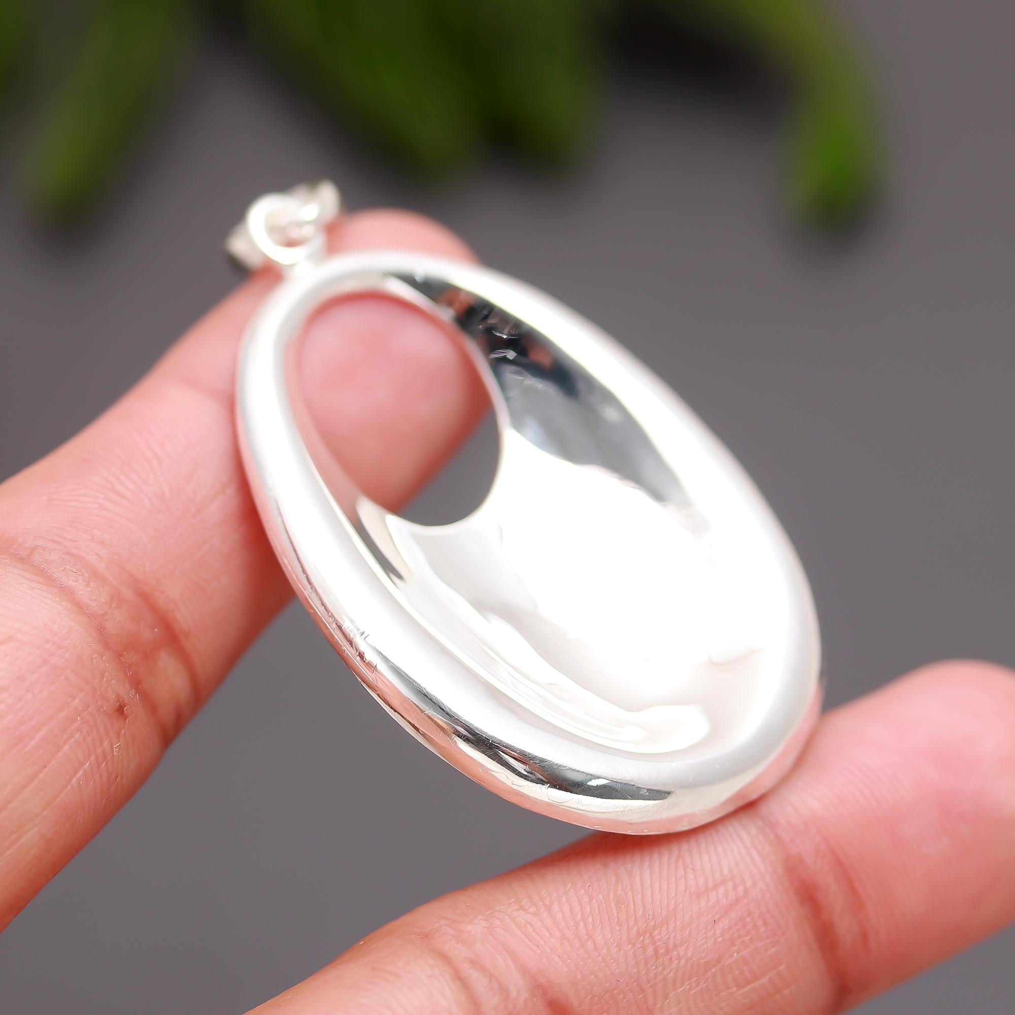 The Liquid Oval: Sculptural Sterling Silver Pendant