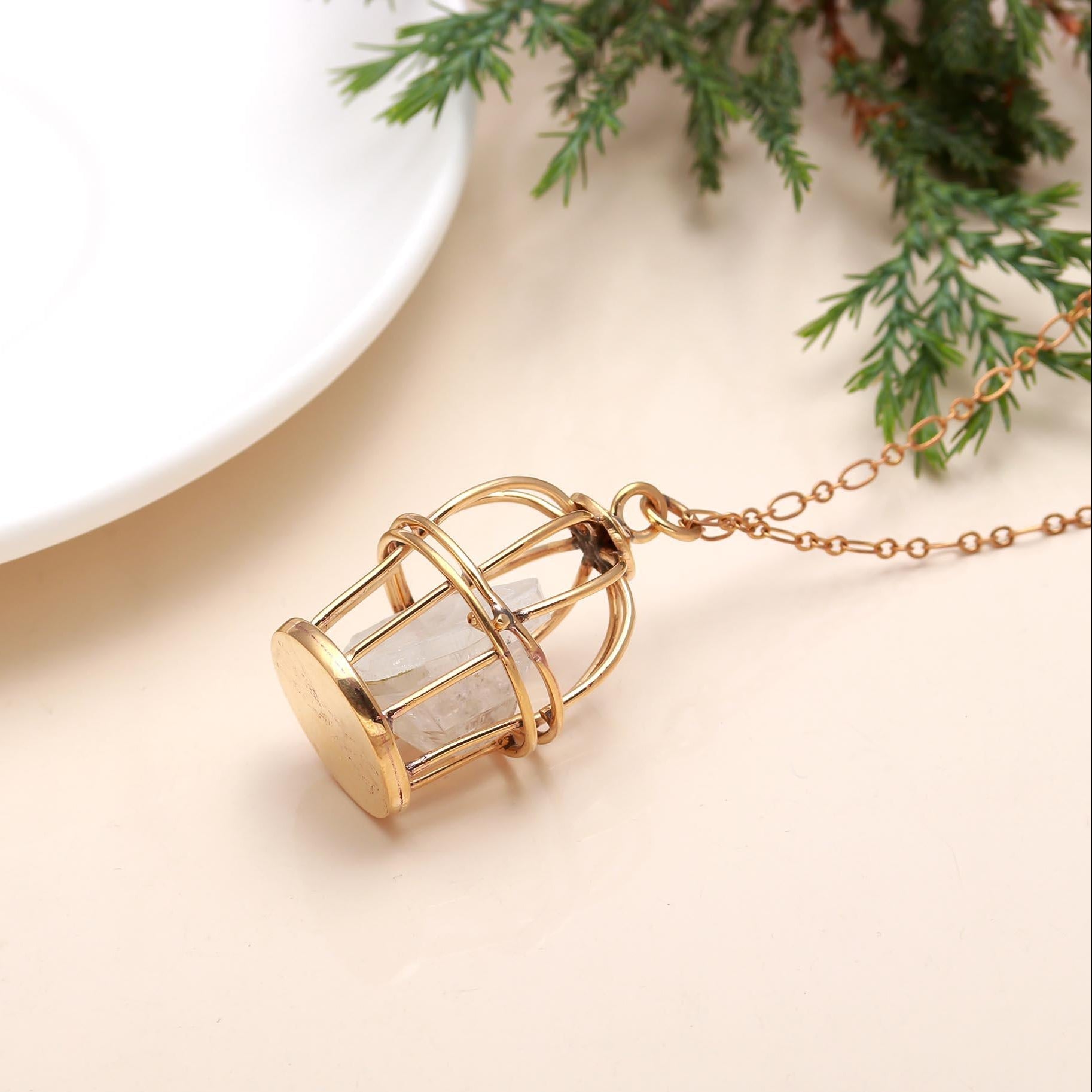 The Gilded Sanctuary: Raw Quartz Cage Pendant Necklace