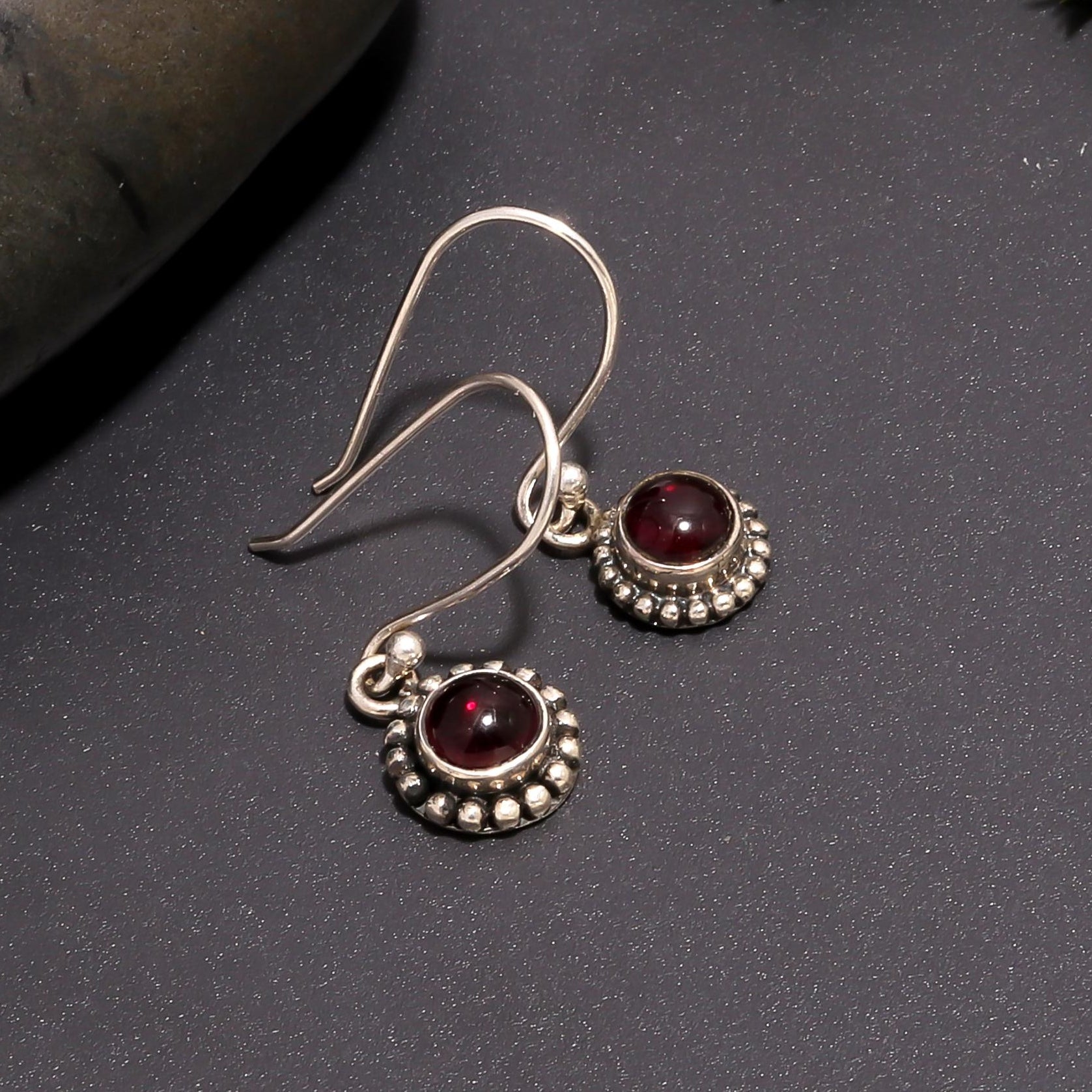 The Garnet Halo: Ornate Silver Garnet Earrings