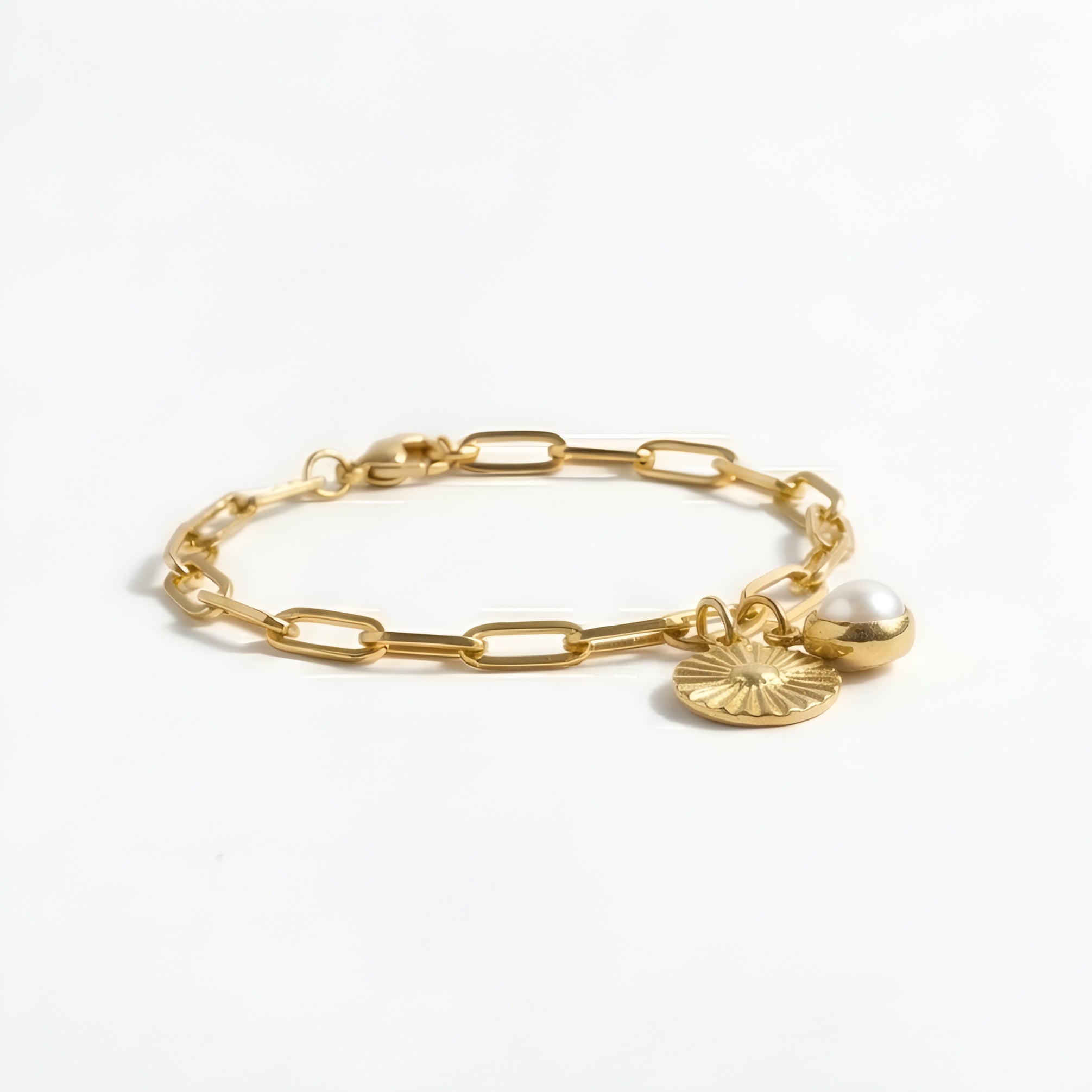 The Soleil Sacré: Sun Medallion & Pearl Charm Bracelet