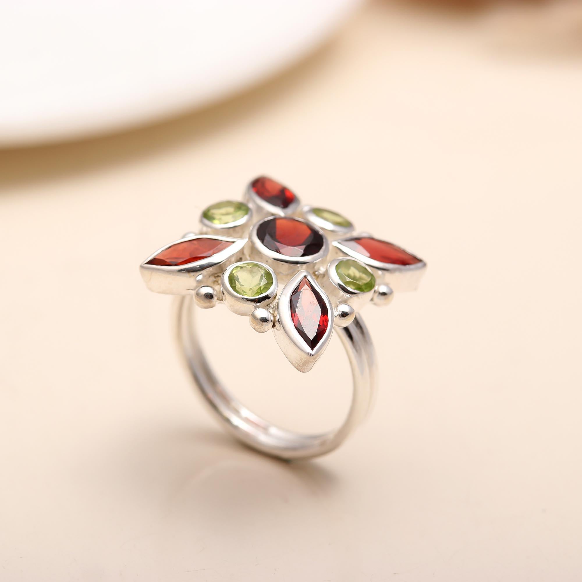 Handcrafted nature-inspired garnet and peridot ring