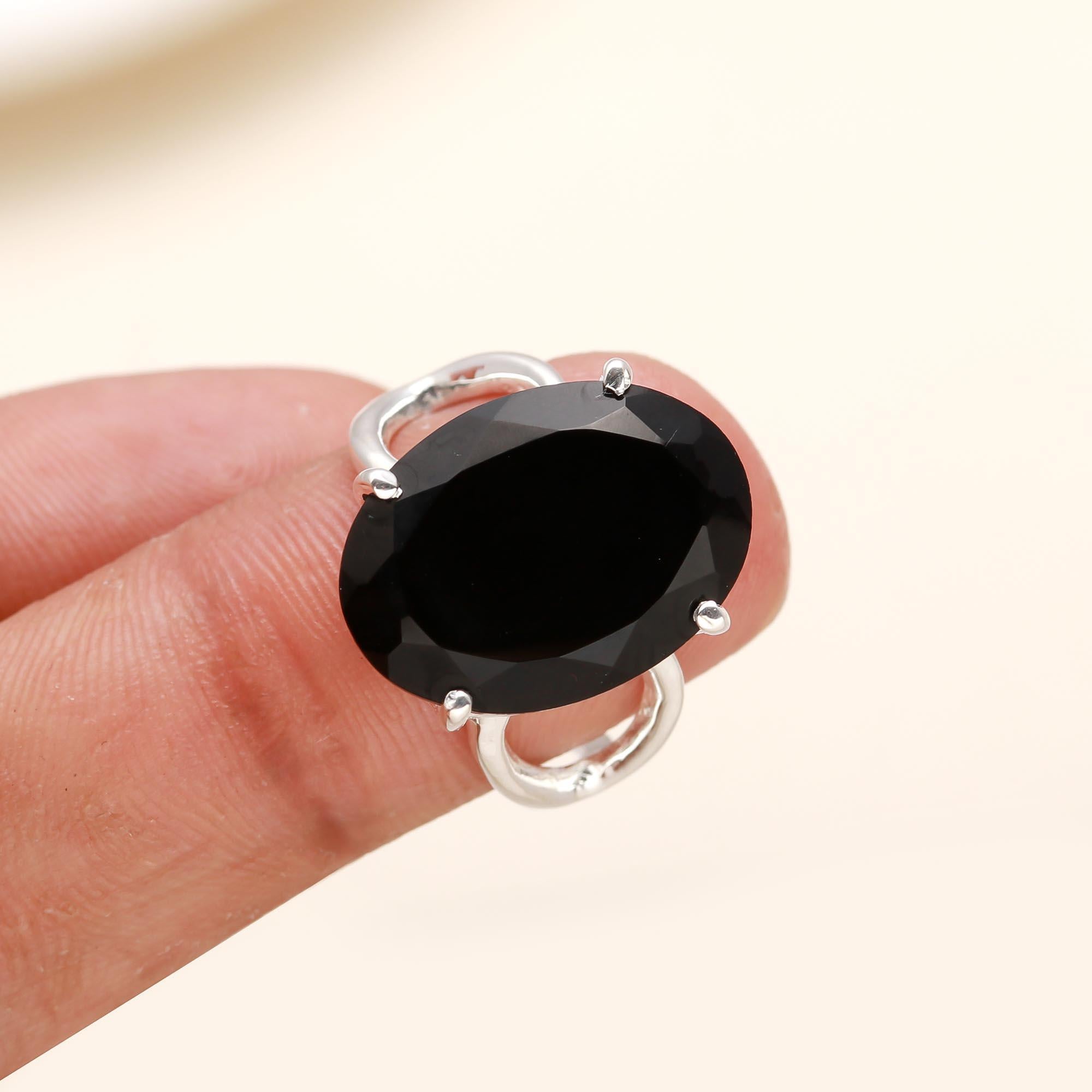 Sterling silver statement ring with oval black onyx