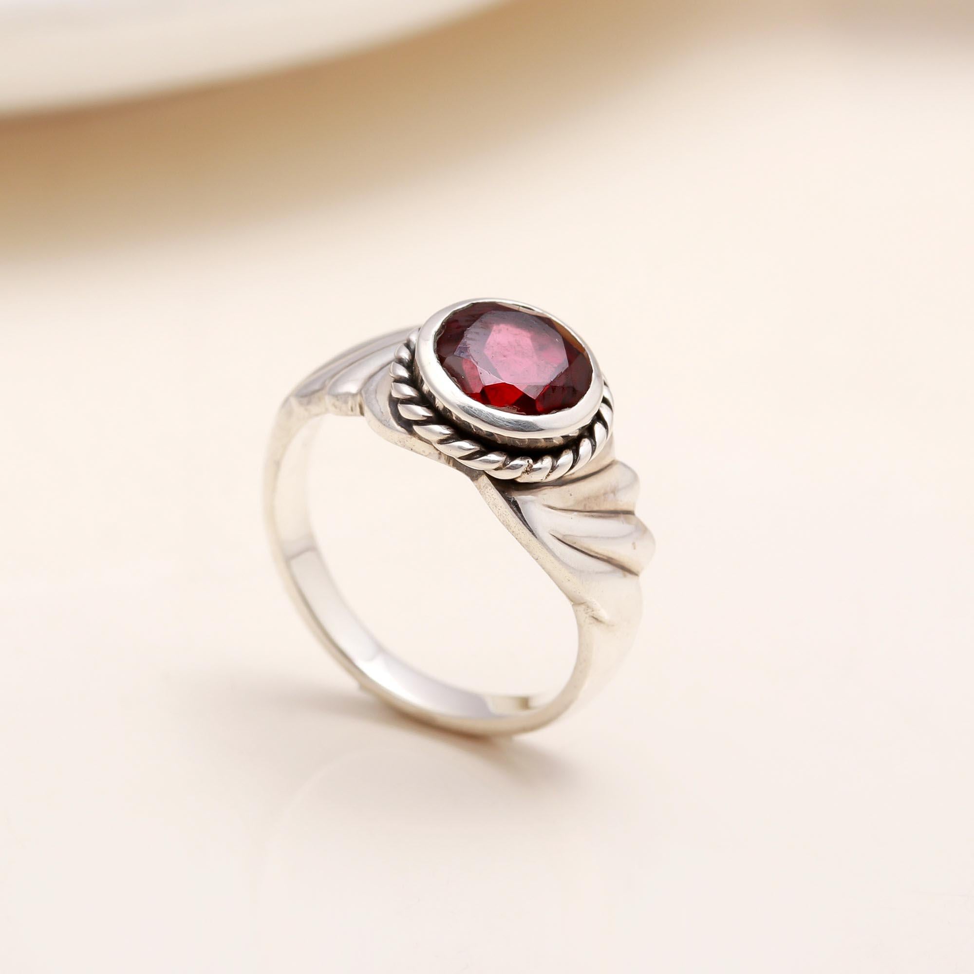 Handmade sterling silver rope band ring with garnet