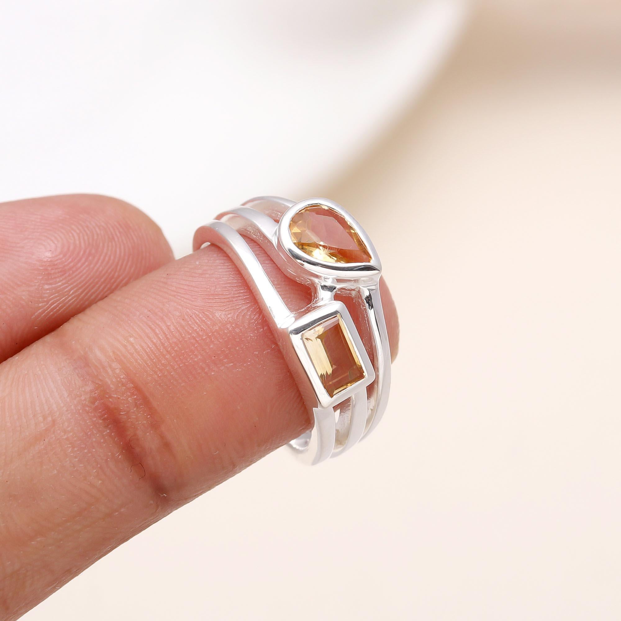 Elegant dual citrine open band ring on finger