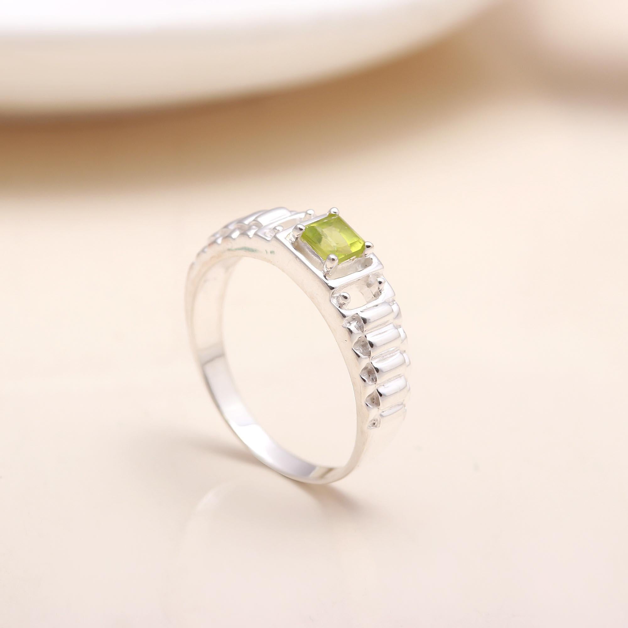 Handmade sterling silver textured ring with peridot