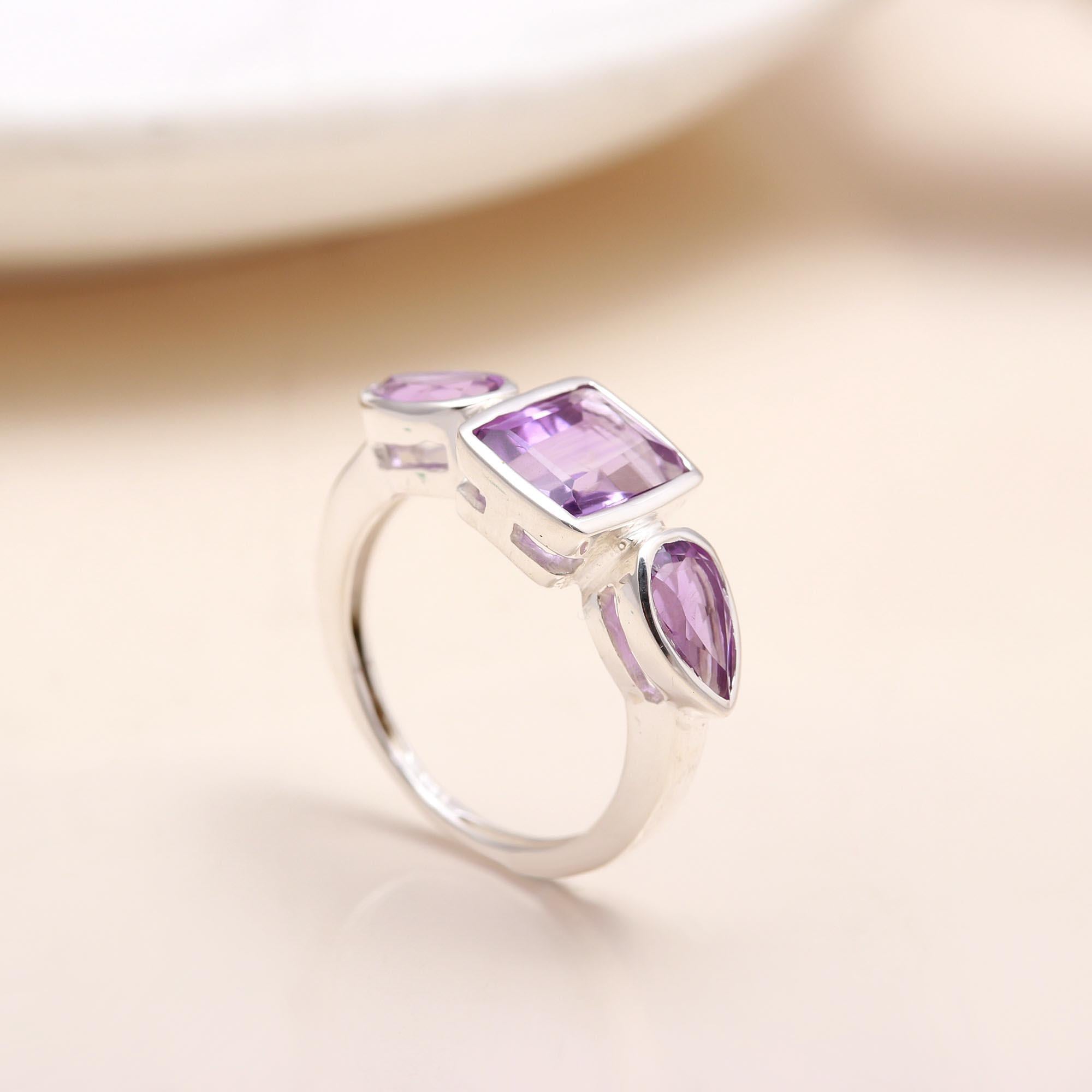 Handmade sterling silver band ring with pear and baguette amethyst