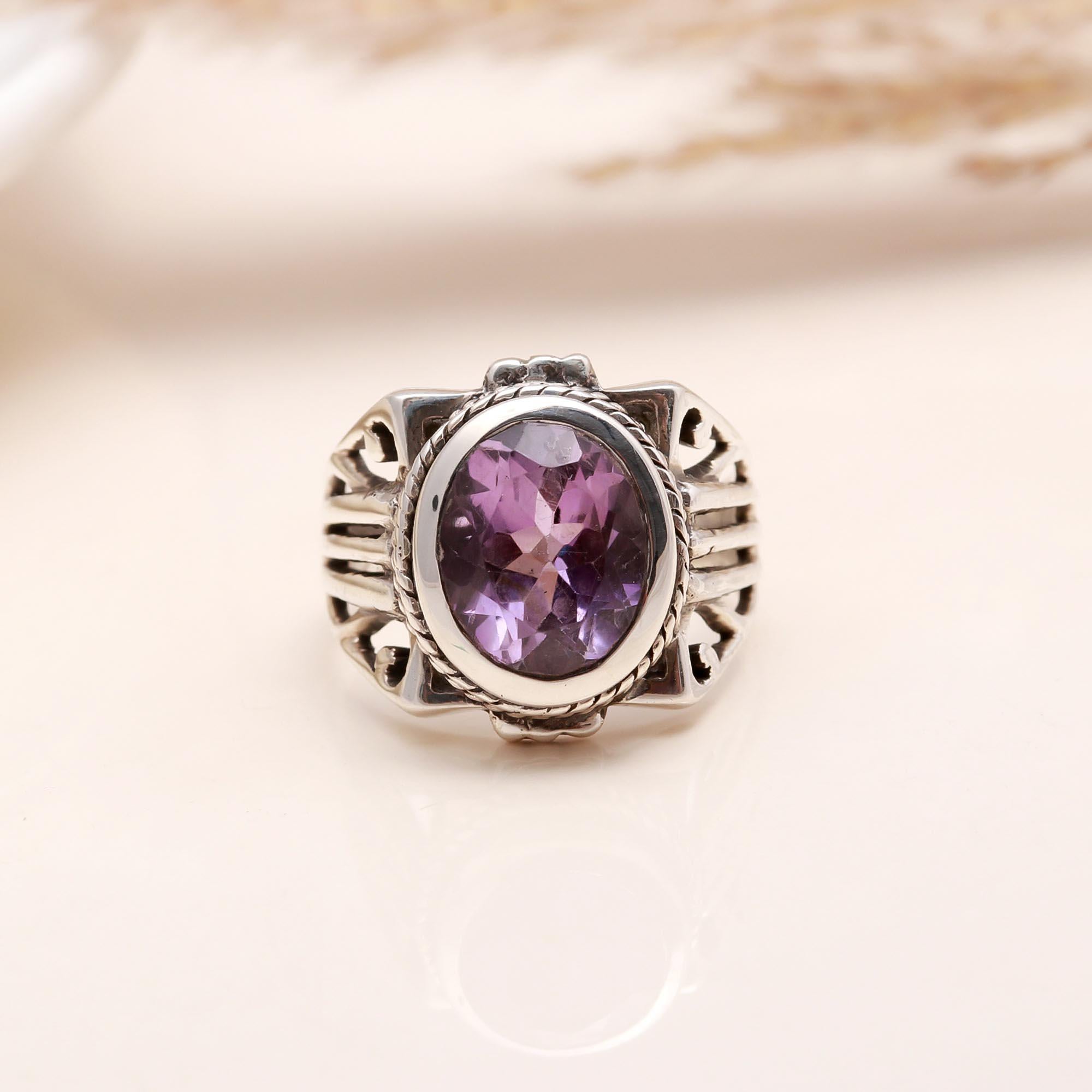 Handmade filigree silver ring with purple amethyst
