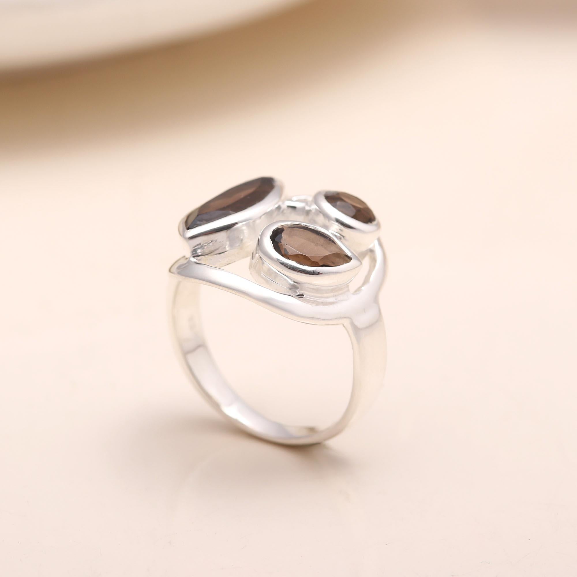 Handmade garnet gemstone ring with artistic design