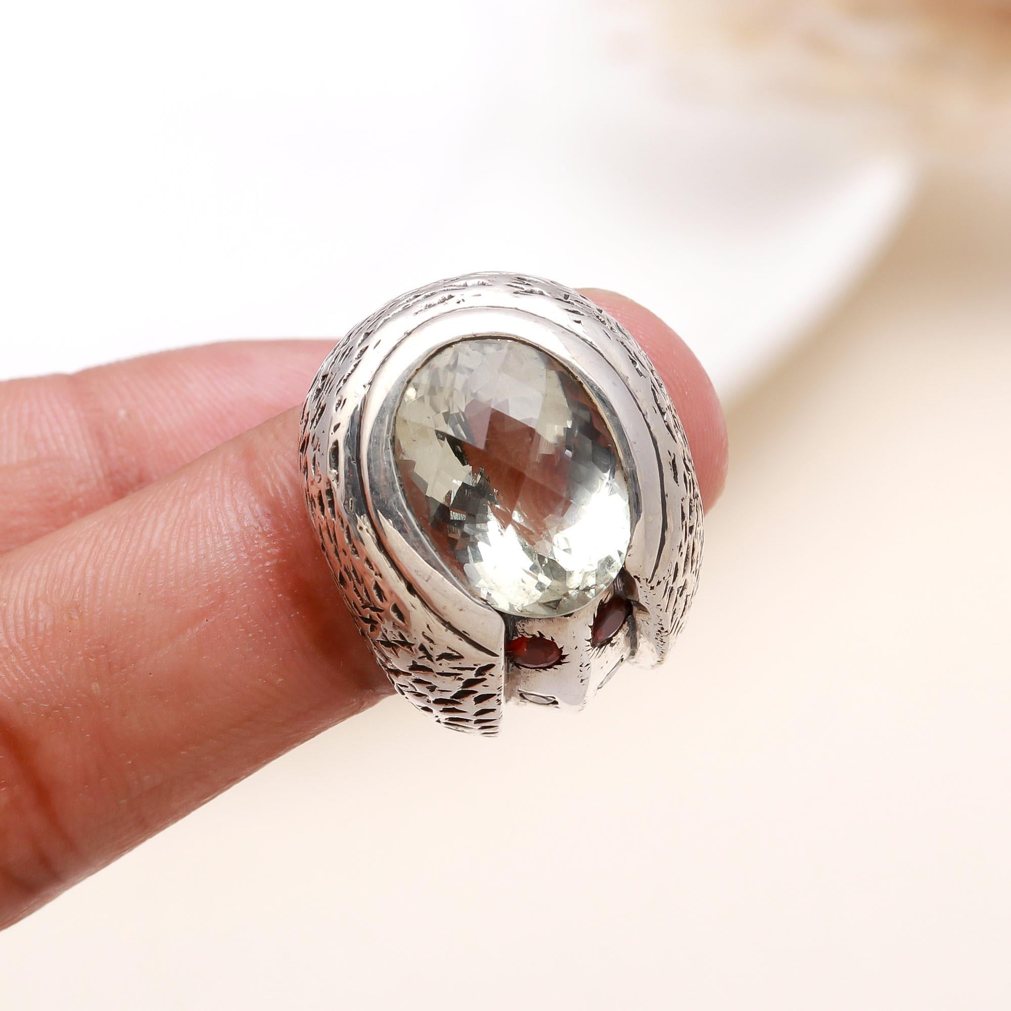 Statement green gemstone ring displayed on Finger