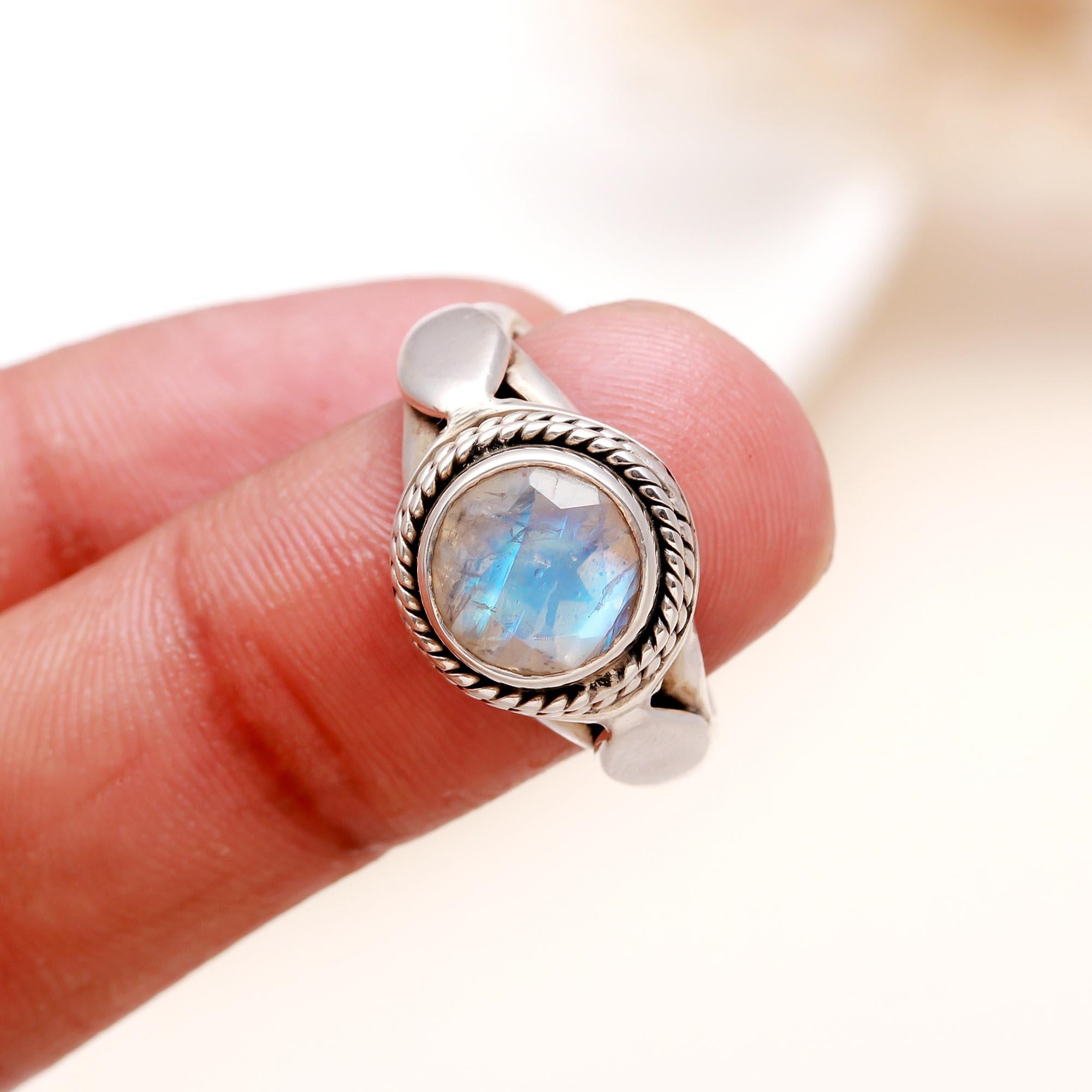 Elegant round moonstone gemstone ring on finger