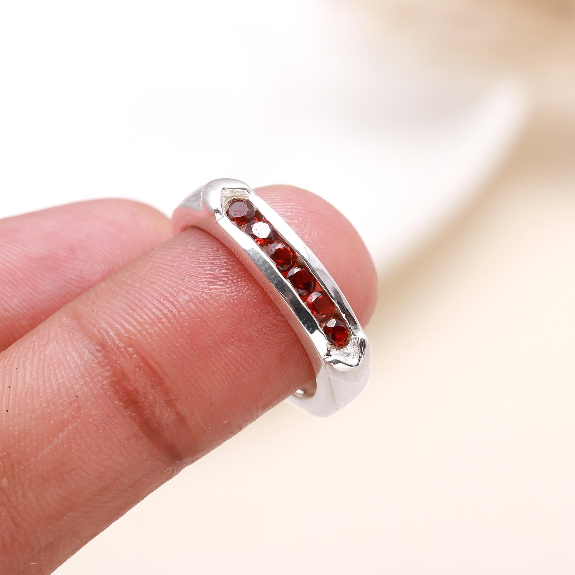 The Red Path: Channel Set Garnet Eternity Style Ring