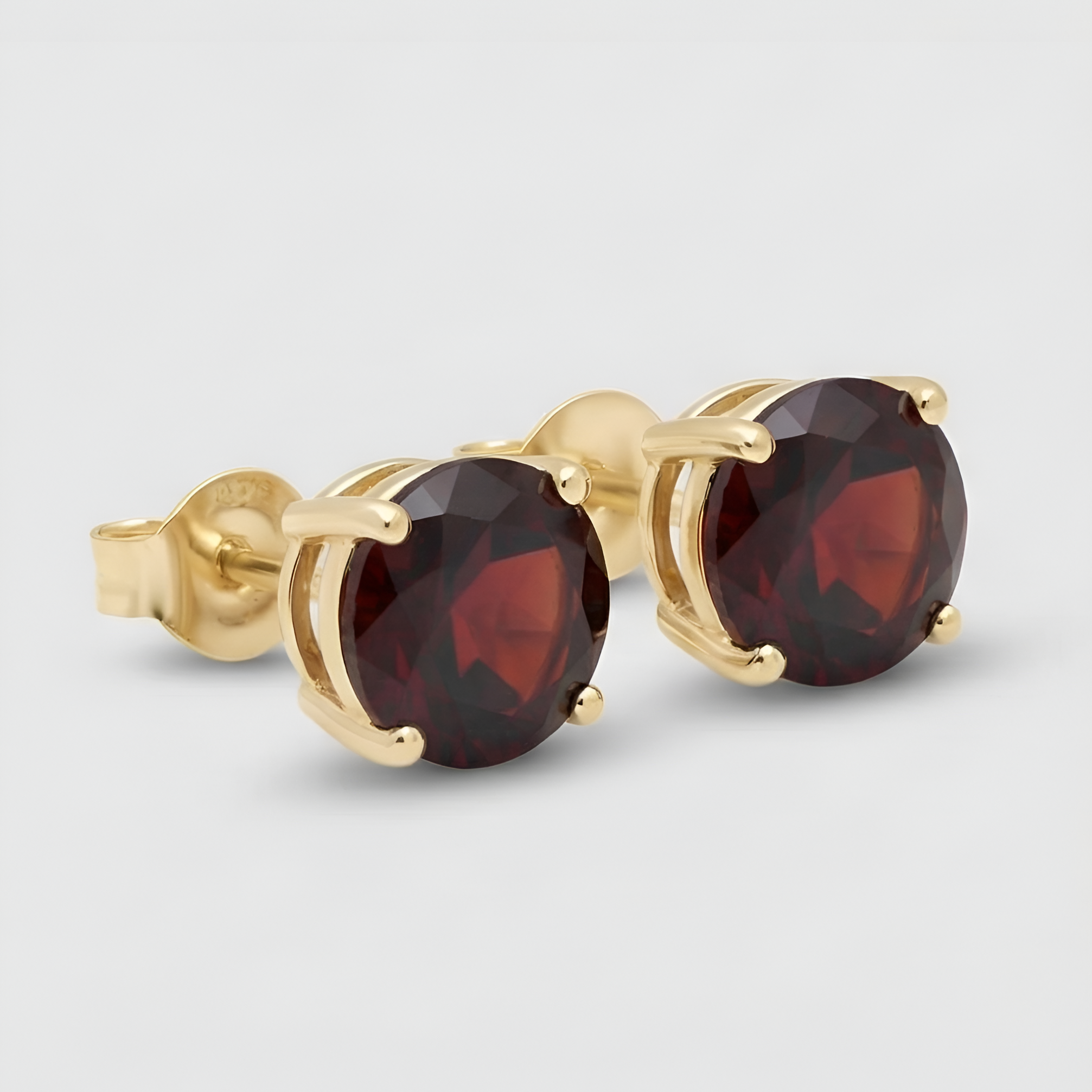 Classic Passion: Gold Plated Round Garnet Stud