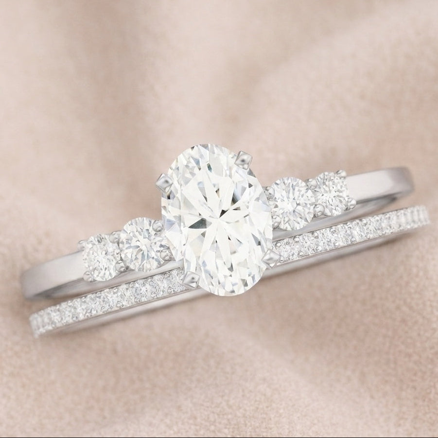 The Starlit Promise: 1.4ct Oval Moissanite Bridal Ring Set
