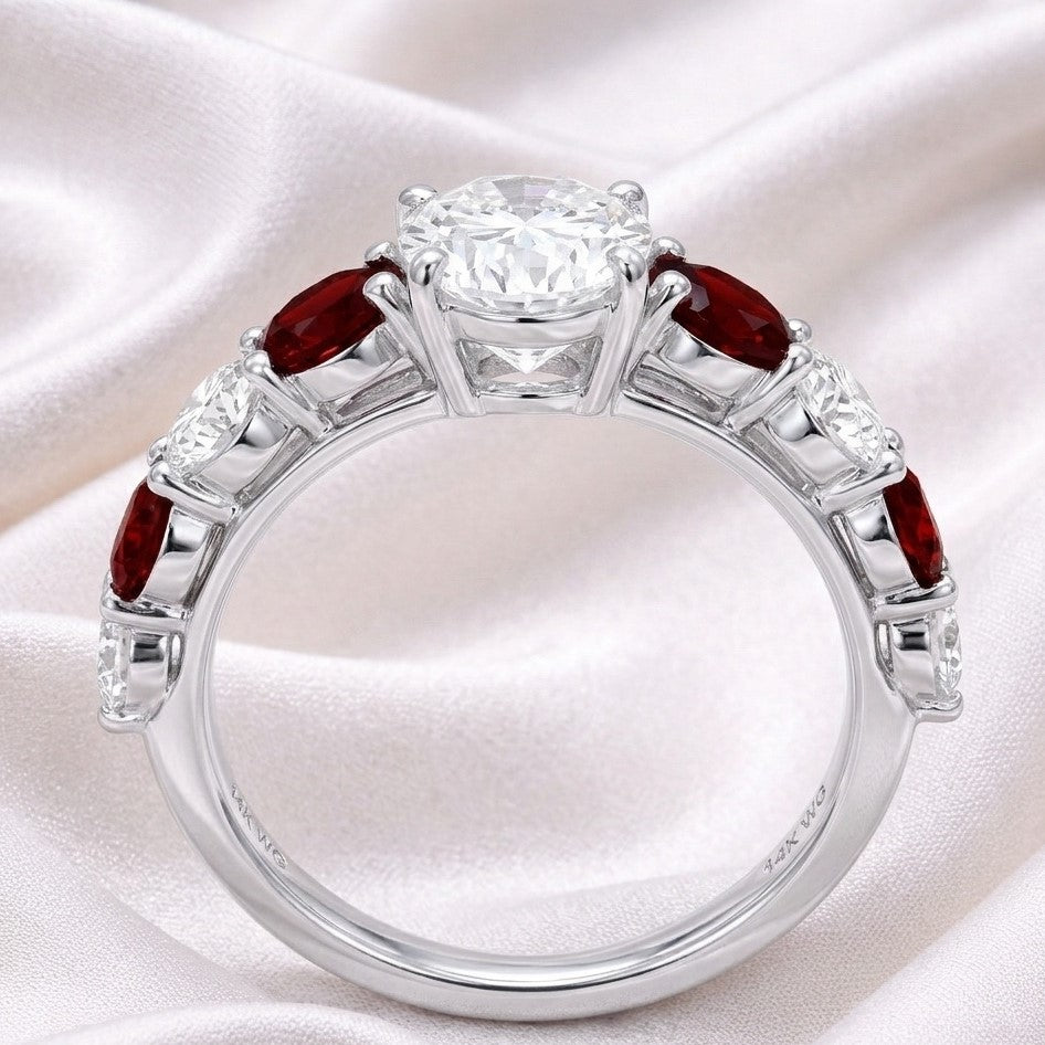 The Crimson Melody: 2.87ct Oval Moissanite & Red Accent Engagement Ring