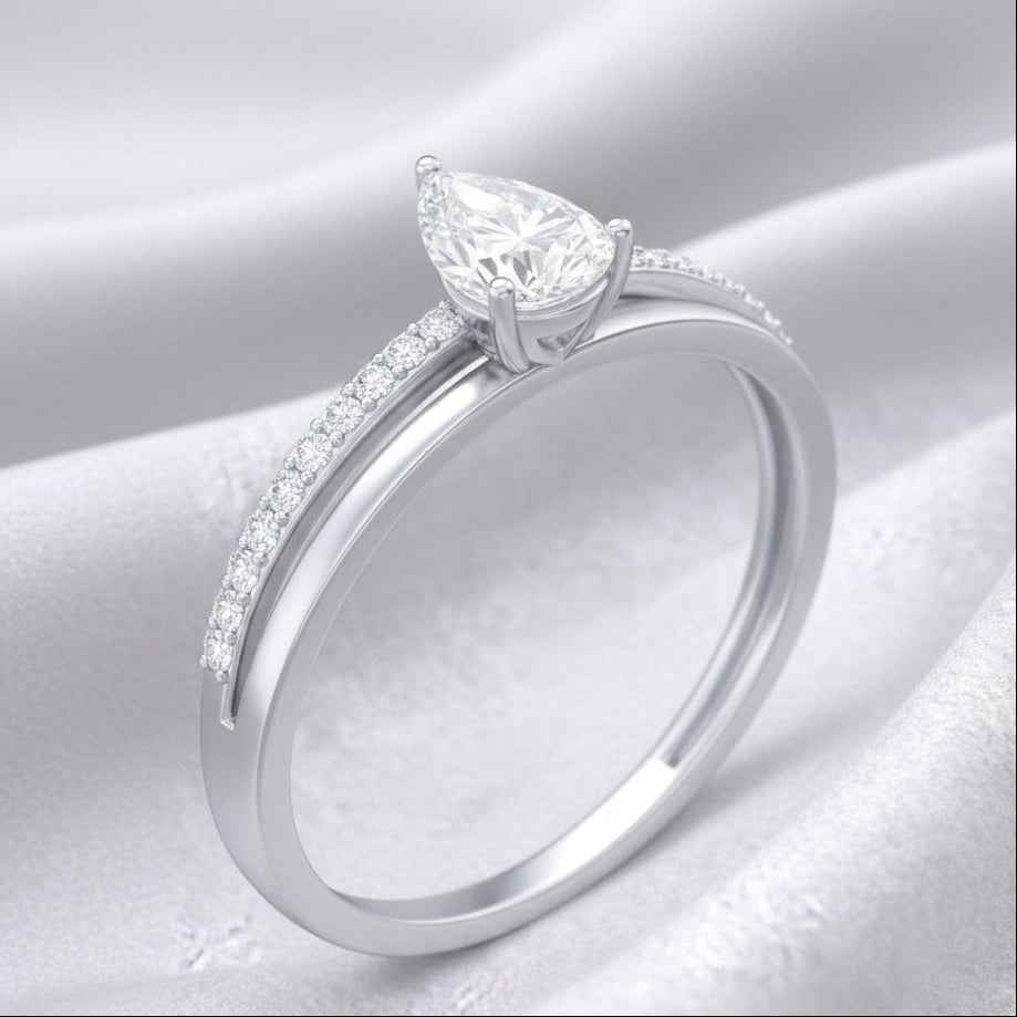 The Graceful Pear: 1.1ct Moissanite Pavé Engagement Ring
