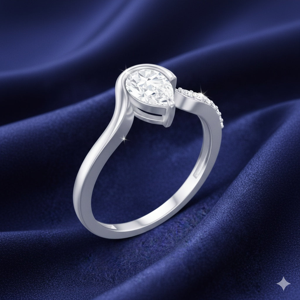 The Fluid Pear: Contemporary Bypass Moissanite Ring