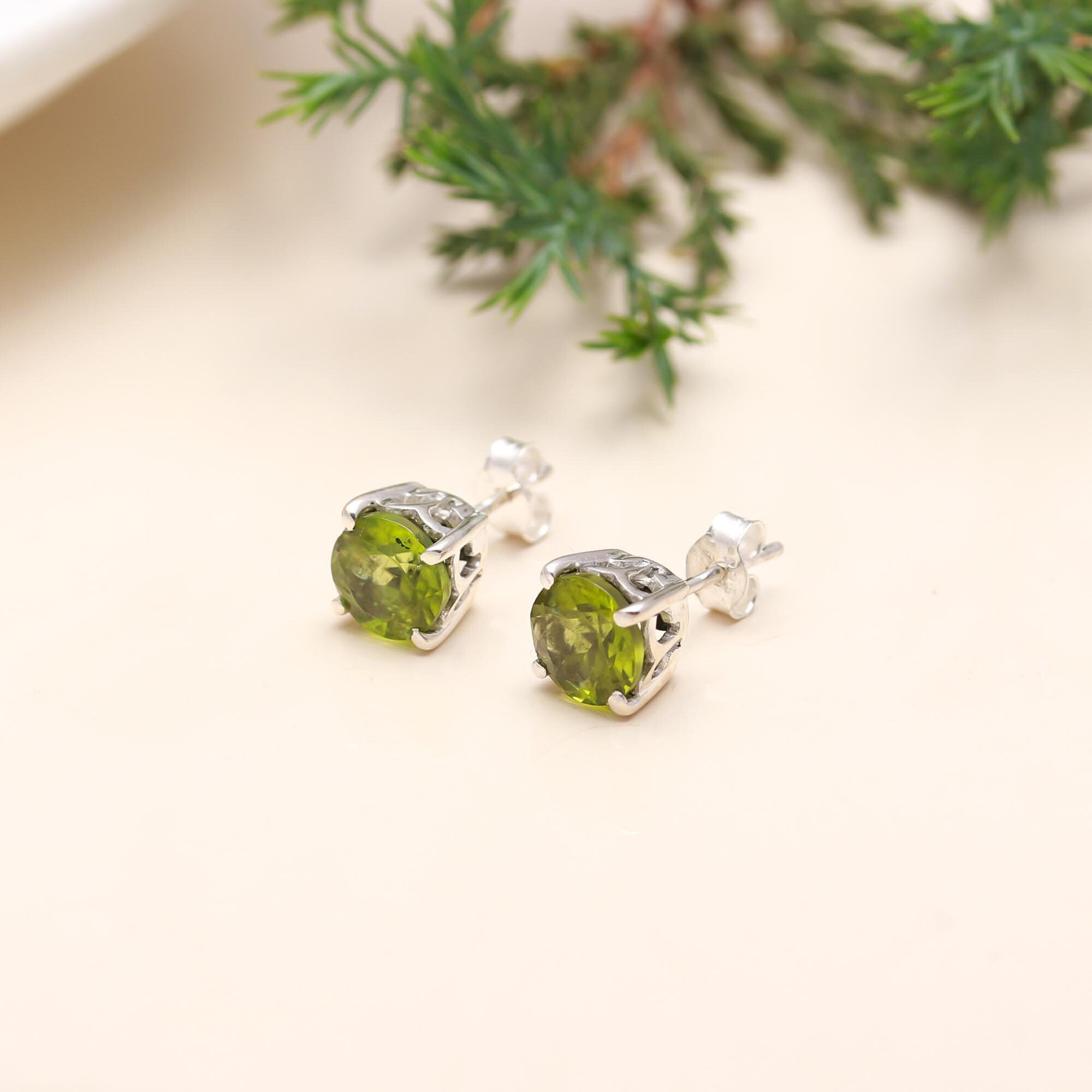 The Verdant Spark: Peridot Solitaire Silver Stud Earrings