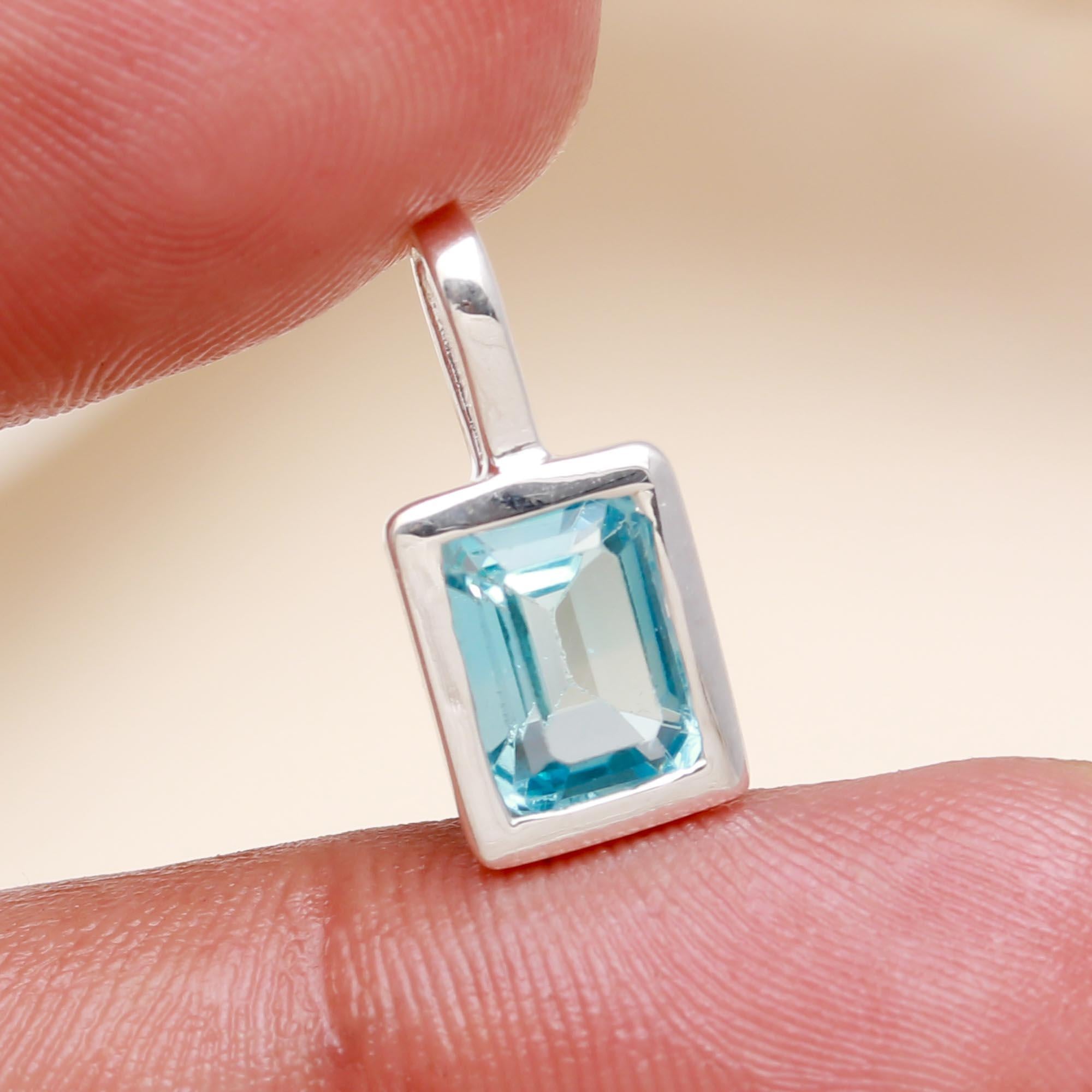 The Azure Prism: Blue Topaz Rectangular Silver Pendant