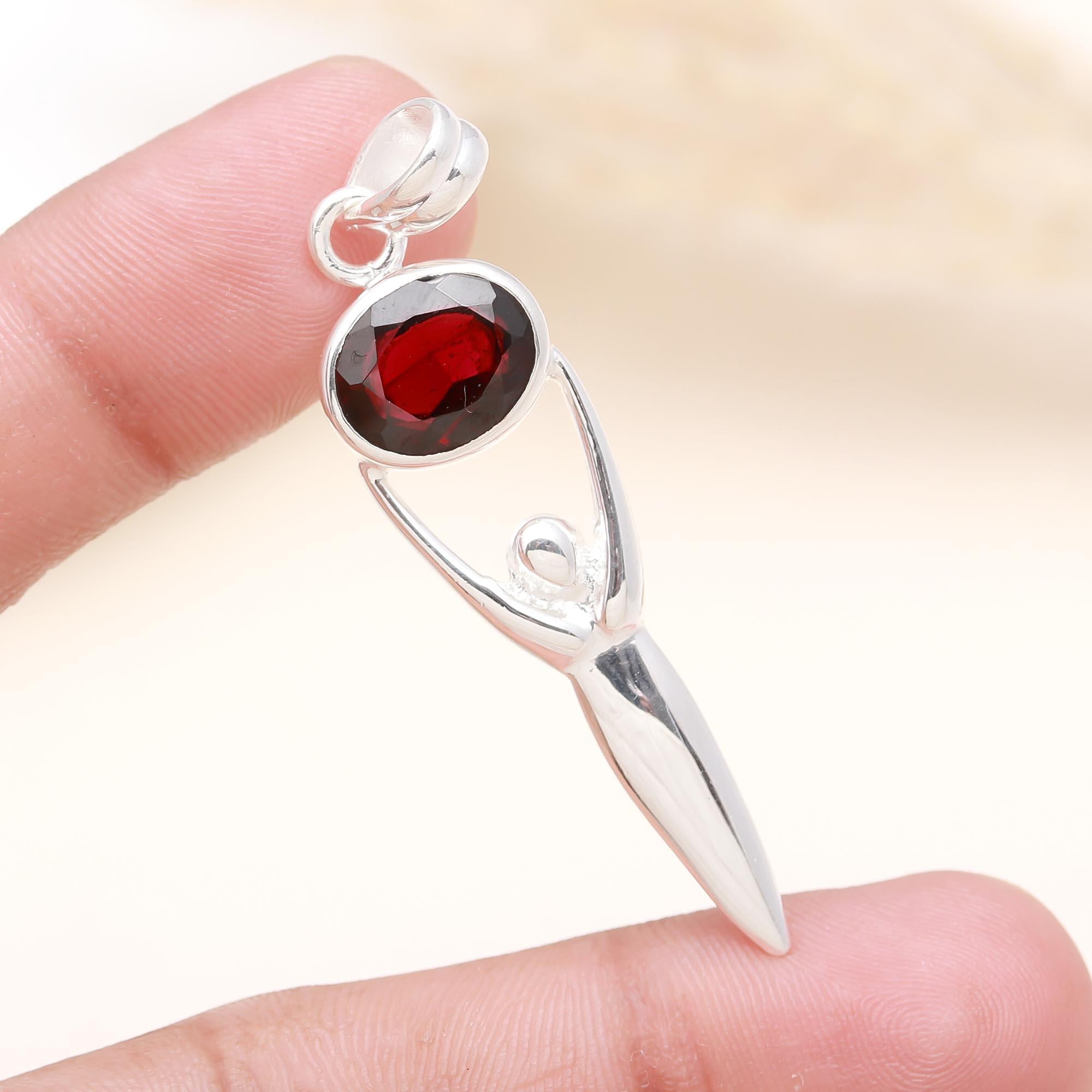 The Abstract Goddess Pendant: Stylized Garnet Figure Pendant