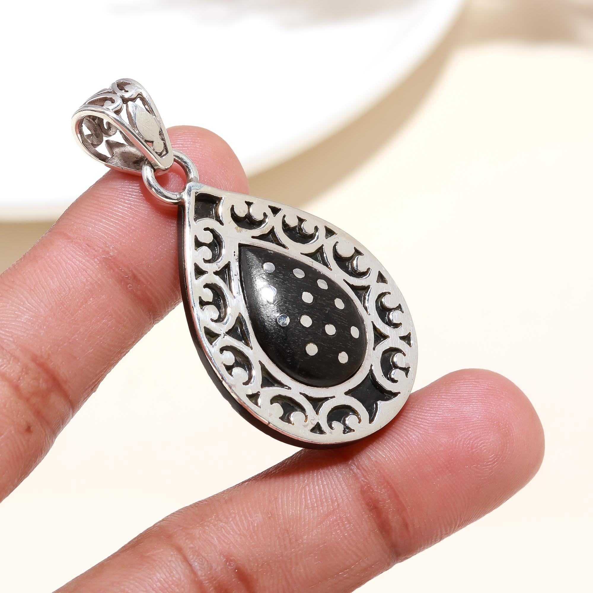 The Midnight Teardrop: Black Onyx Dotted Scroll Filigree Silver Pendant