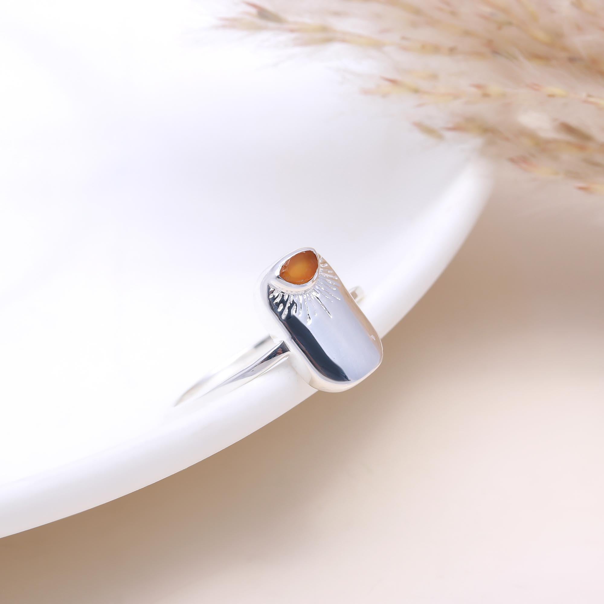 The  Evening Glow: Carnelian Sunburst Signet Ring