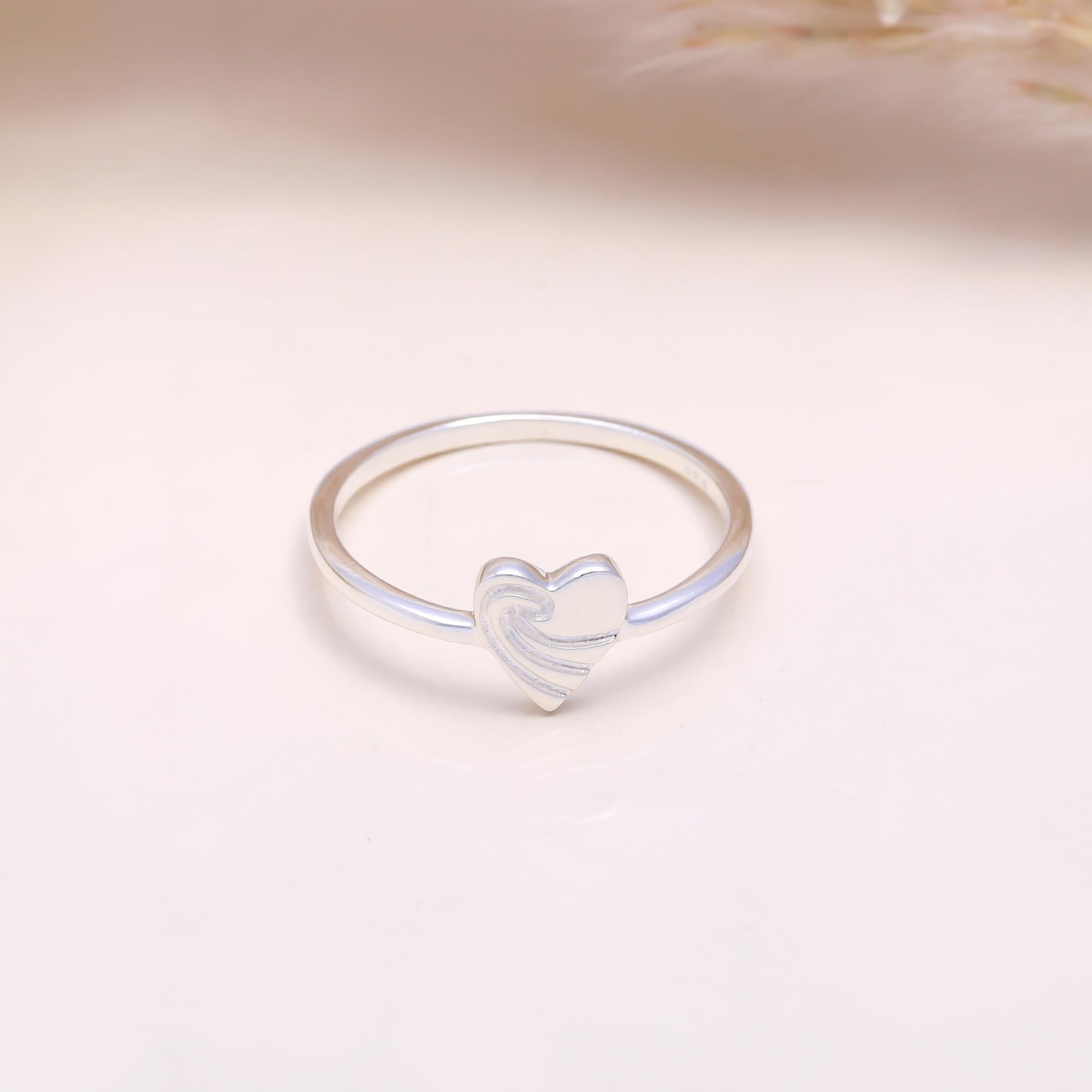 The Heart of the Sea: Wave Engraved Heart Ring