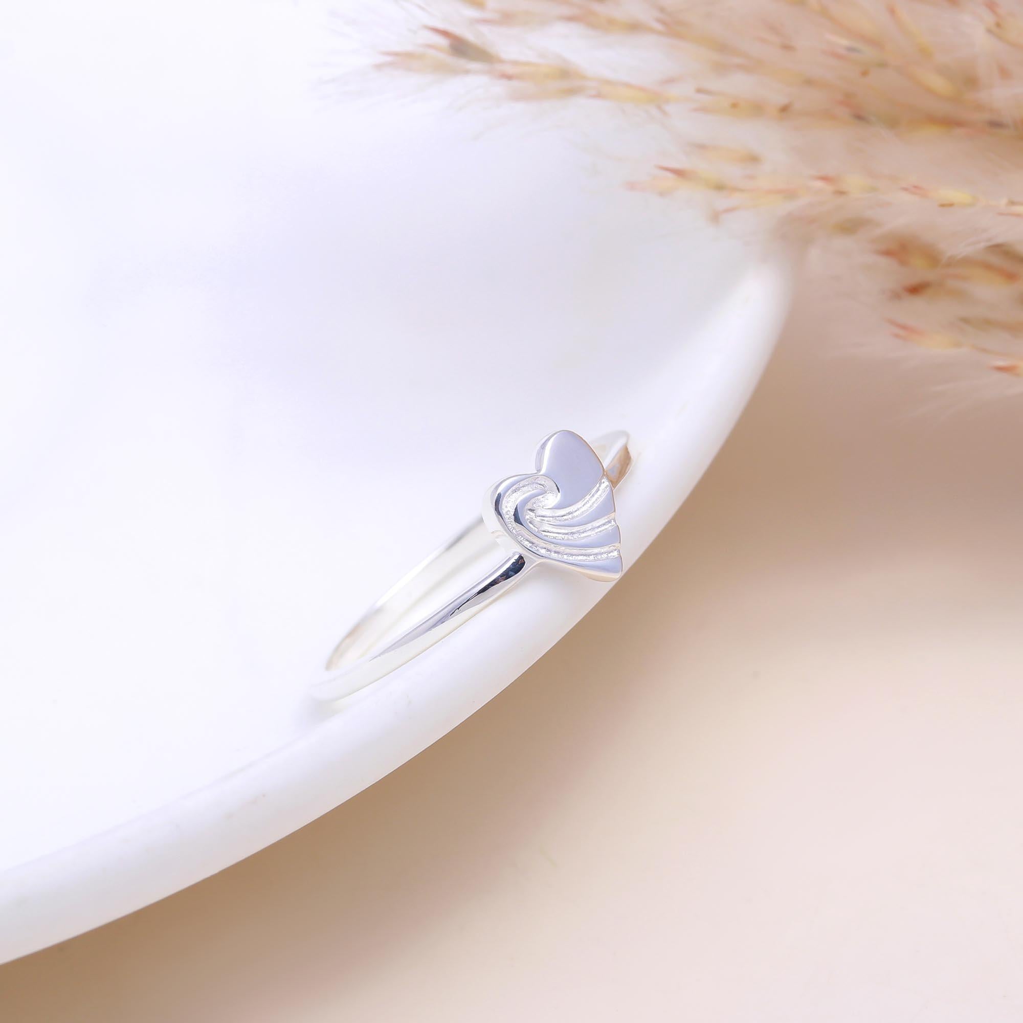 The Heart of the Sea: Wave Engraved Heart Ring
