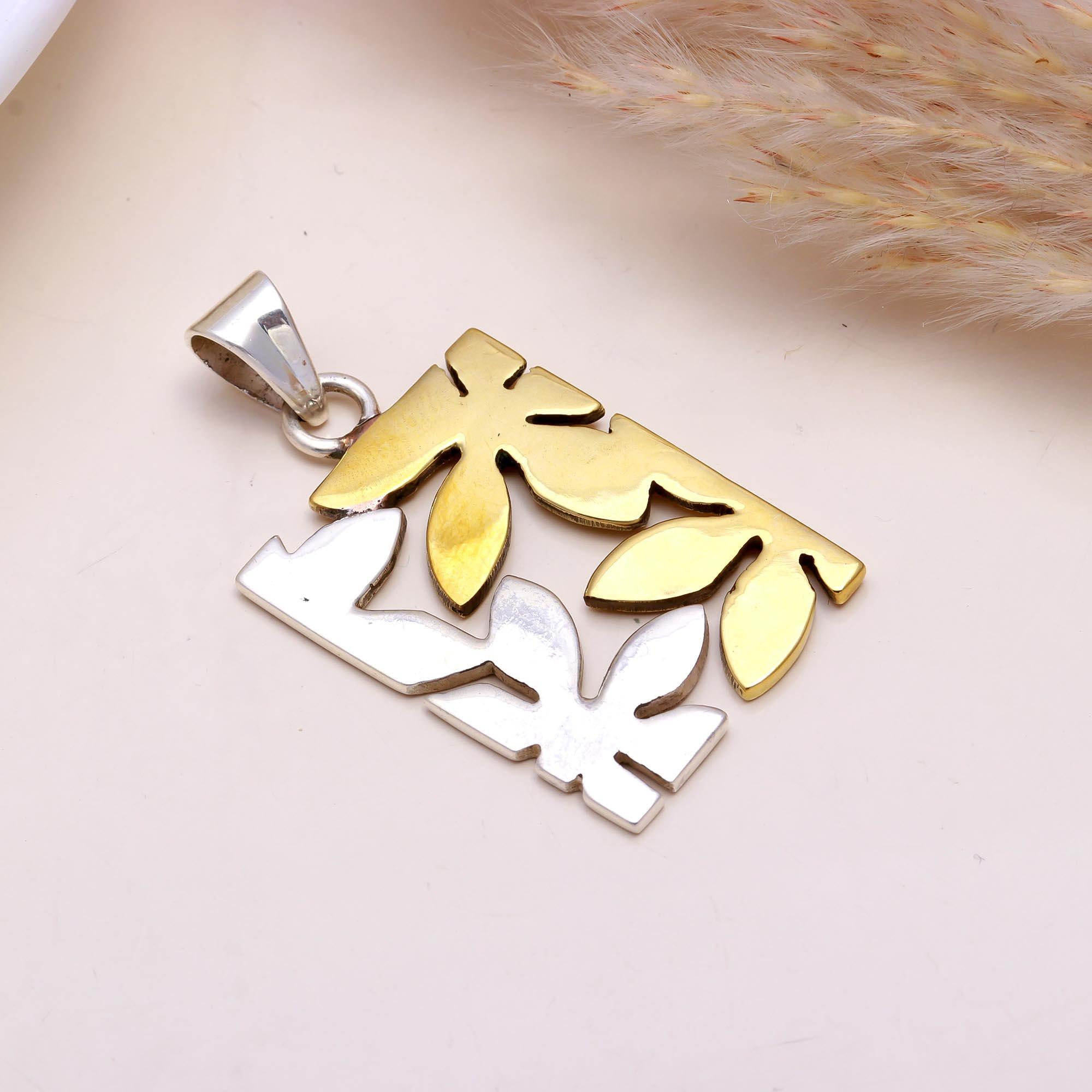 The Botanical Puzzle: Two-Tone Geometric Leaf Pendant
