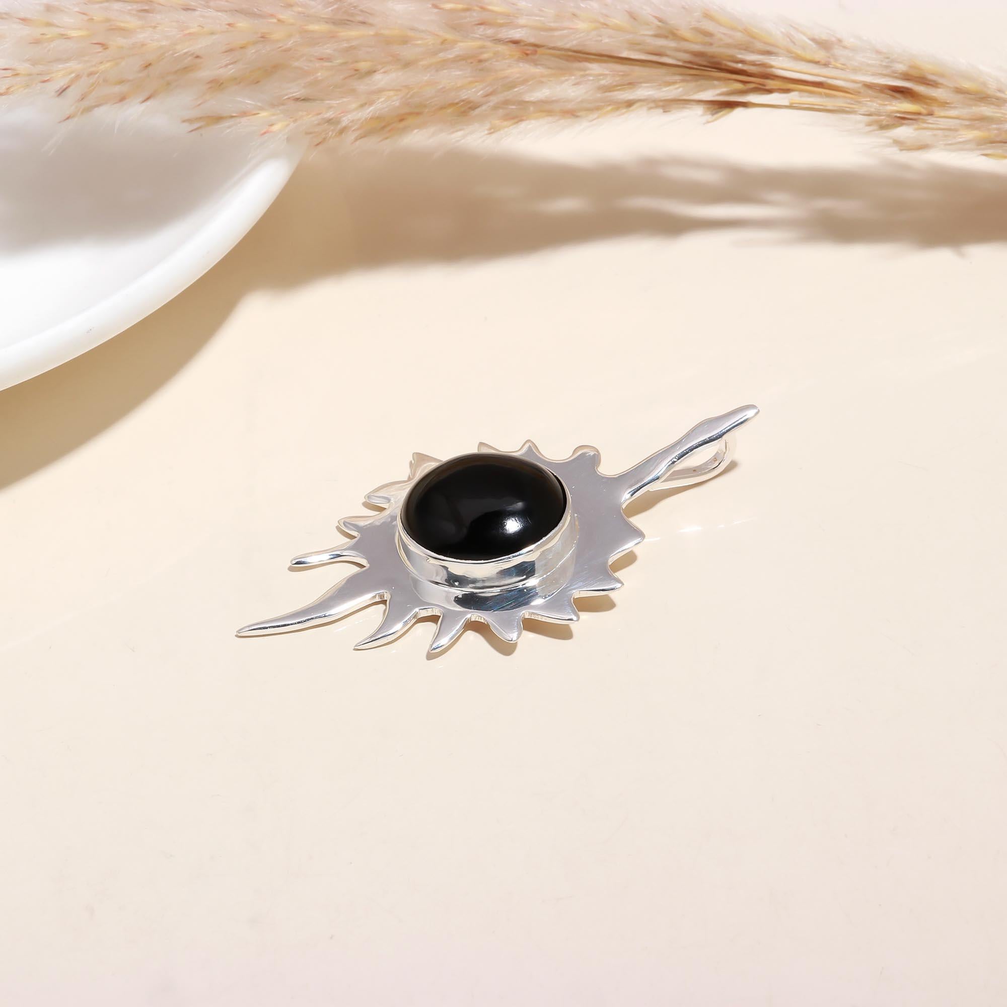 The Onyx Starburst: Celestial Flame Pendant